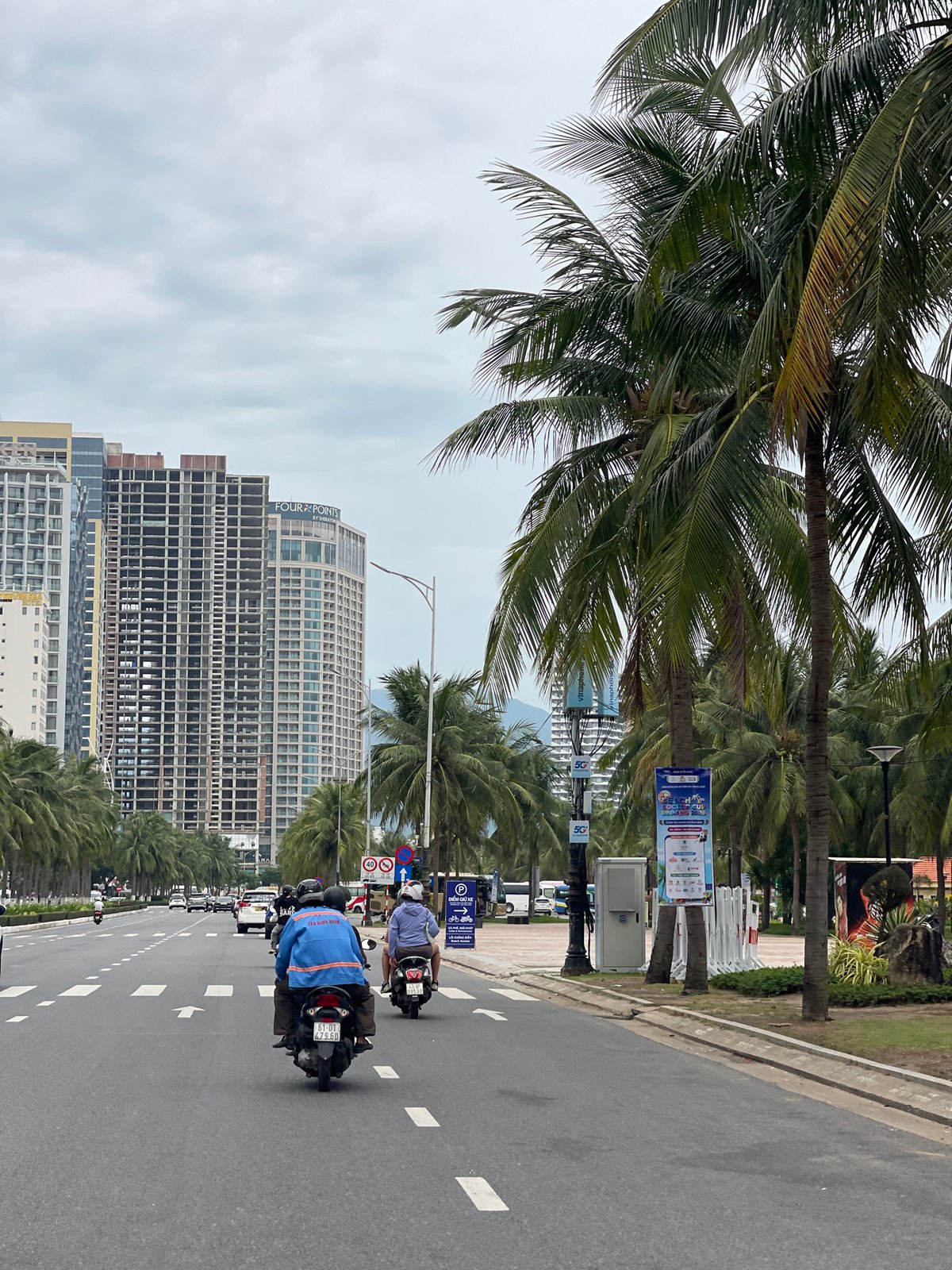 Exploring a Vietnamese harbor town by scooter and on foot