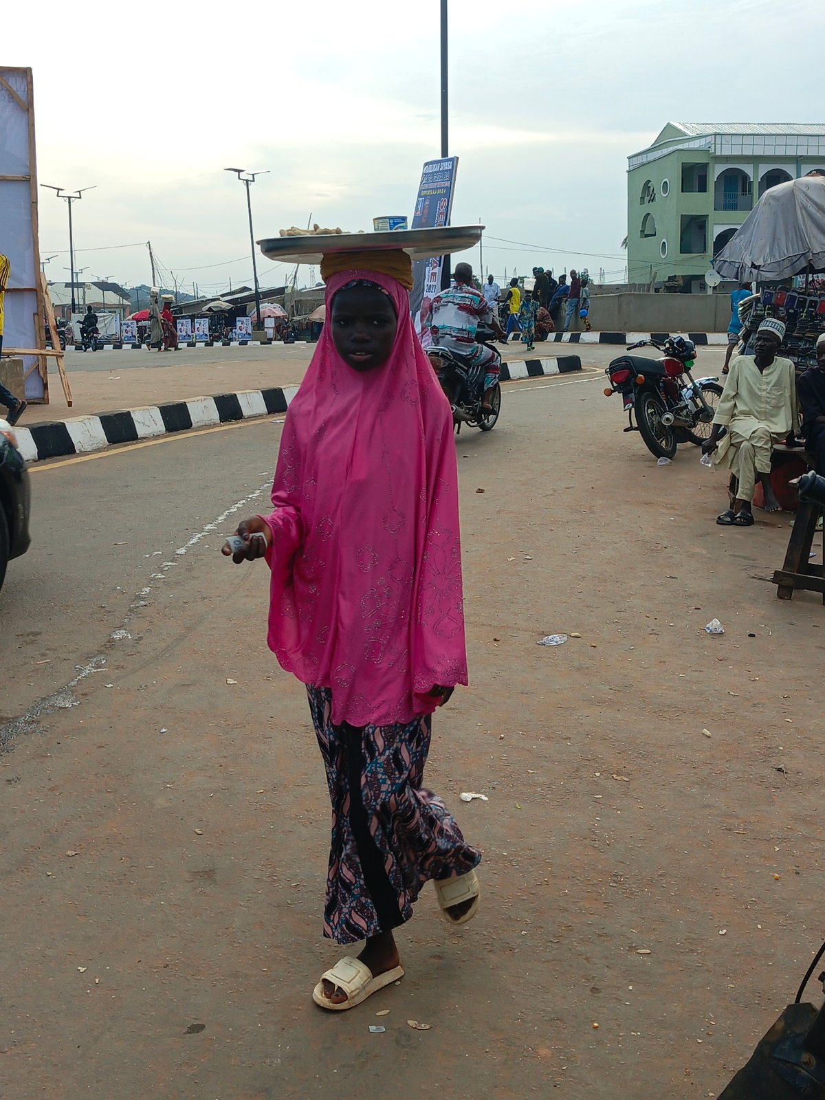 Foot traffic and commerce on the streets of Akwanga, Nigeria