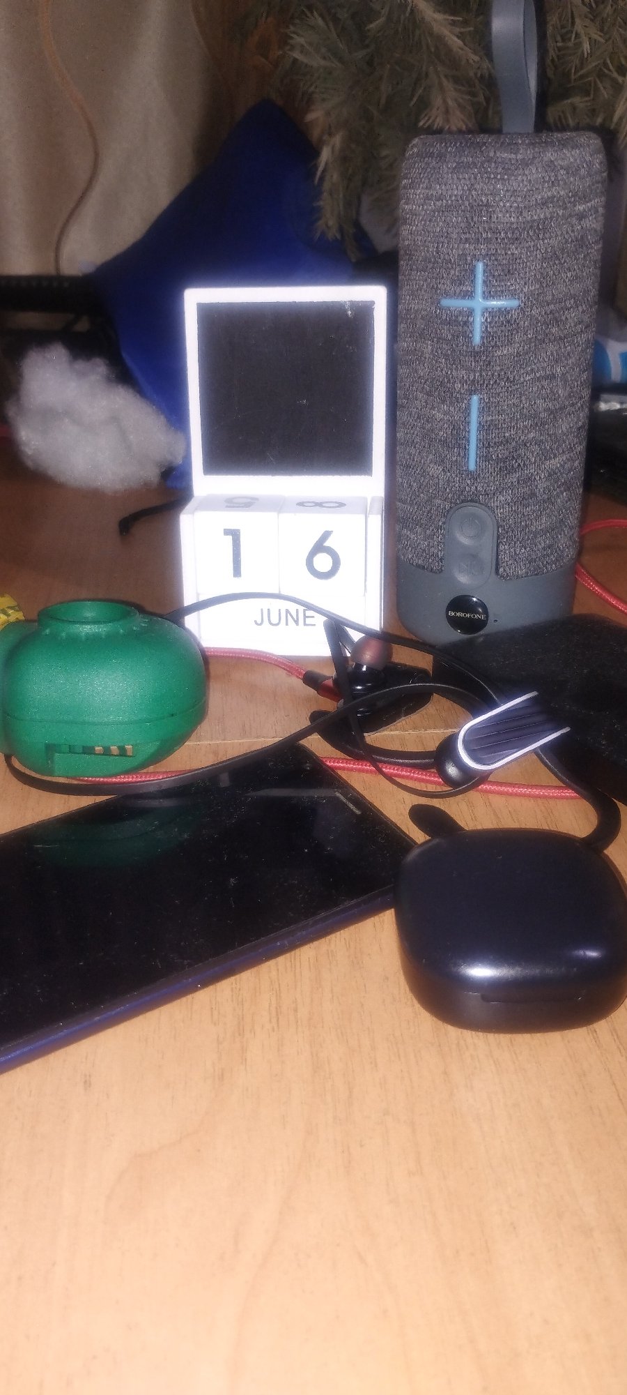 Cats, gadgets, and TMNT erasers in a casual indoor setting