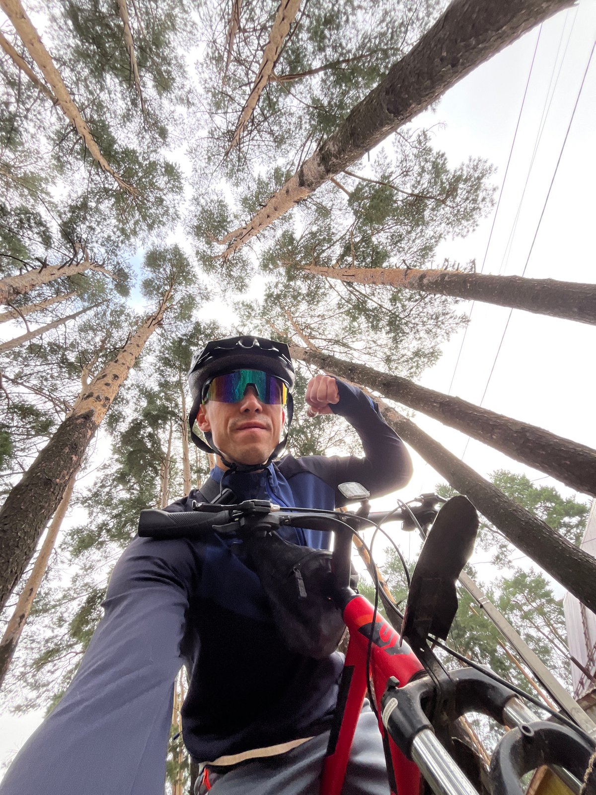 Mountain biking through pine forests near Chaikovsky, Russia