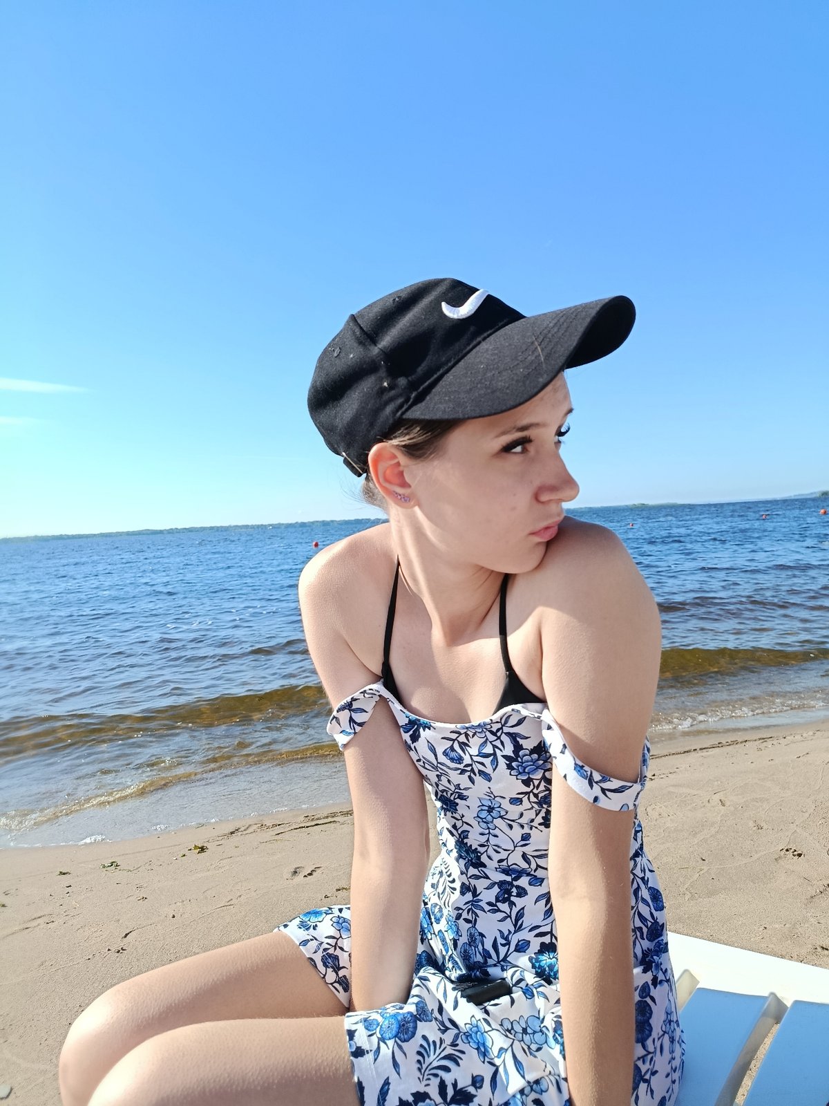 A sunny day at a dark-sand beach