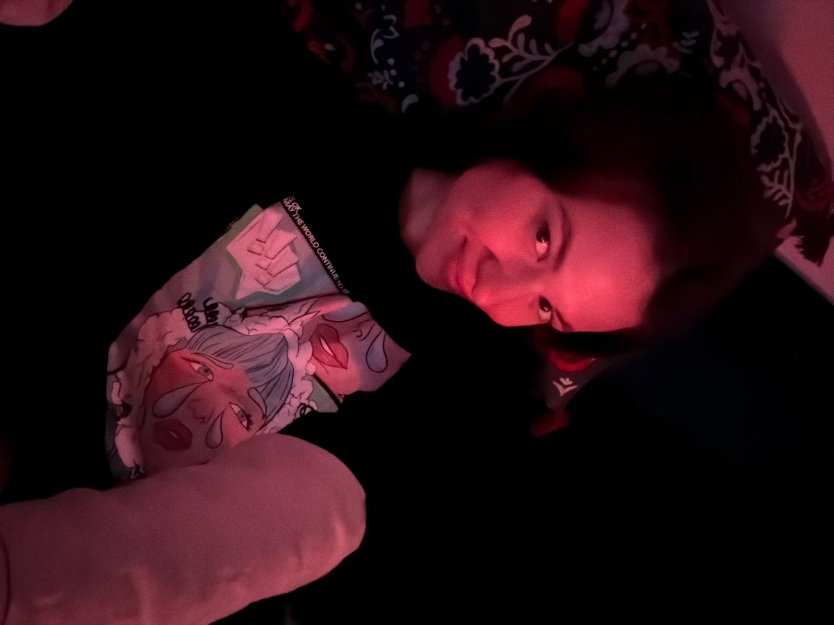 Person photographed resting on fabric in Belgrade evening