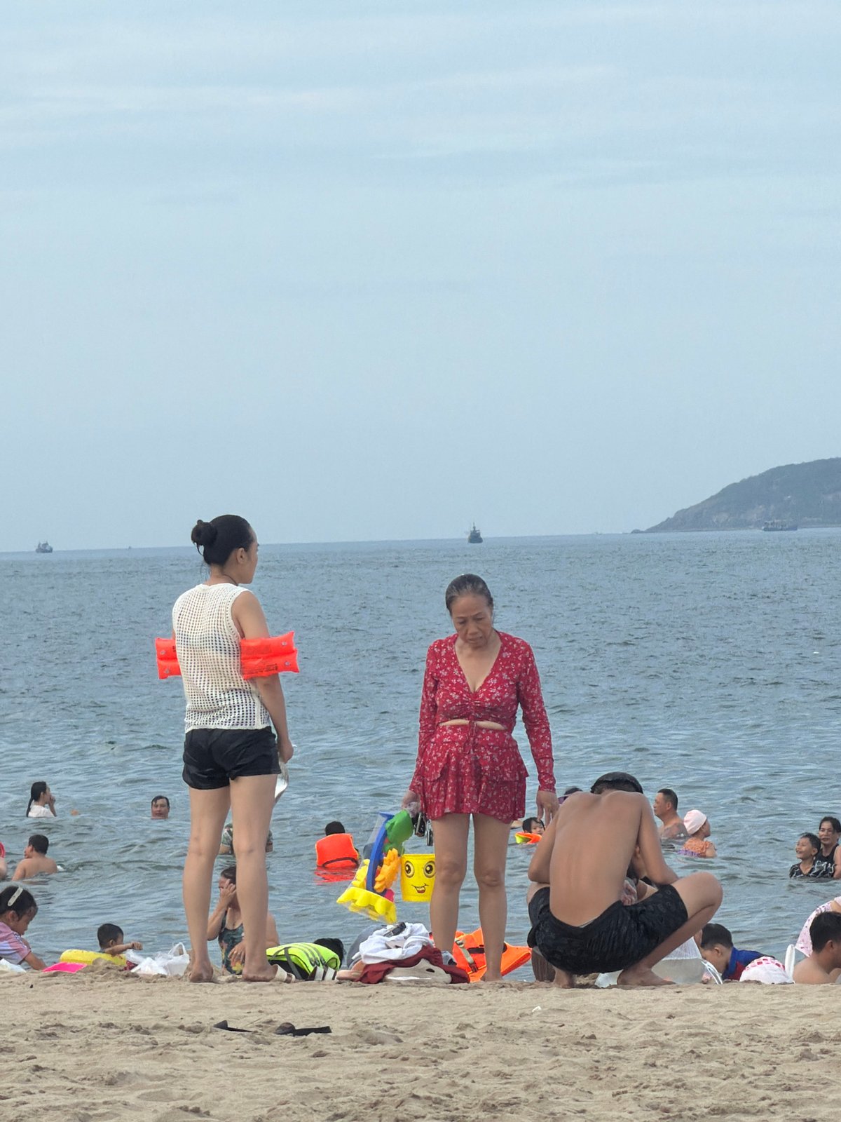 Nha Trang beachfront in full swing on a cloudy morning