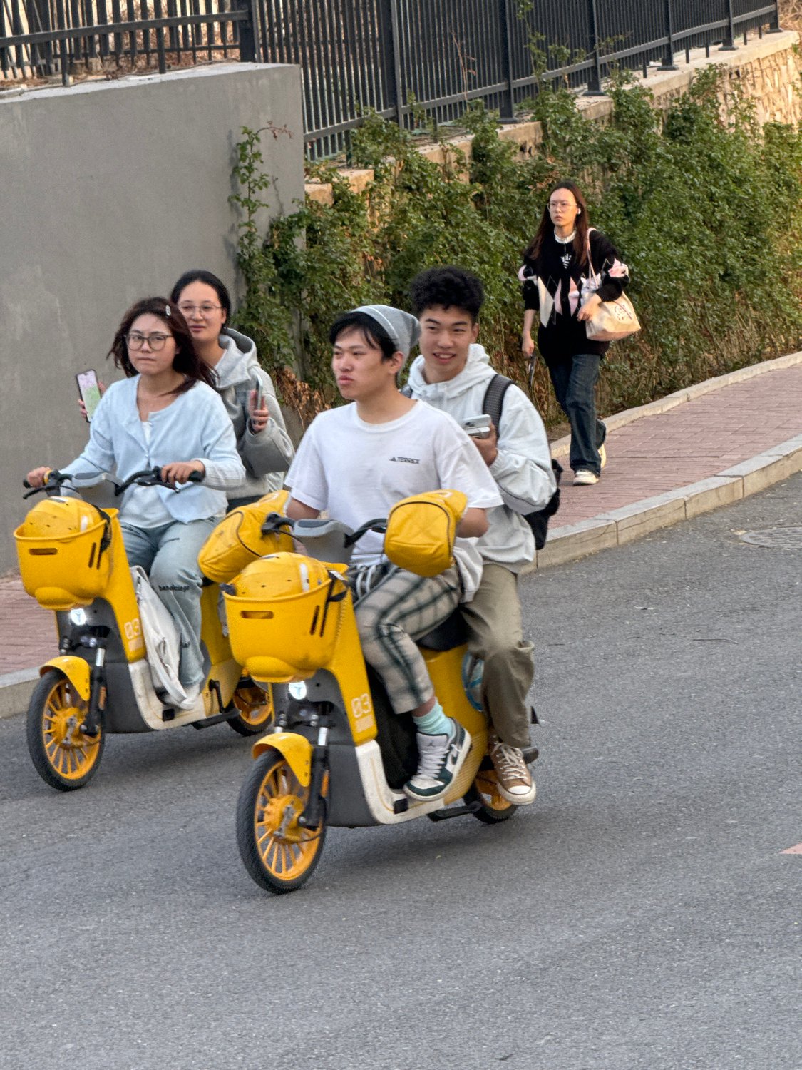 Young people documented in casual street scenes, Zhongtun China