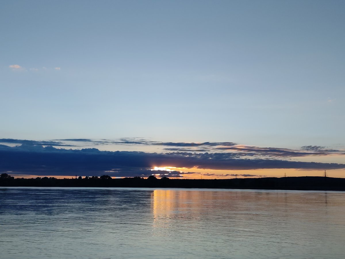 Sunset captured over water near Chaikovsky, Russia