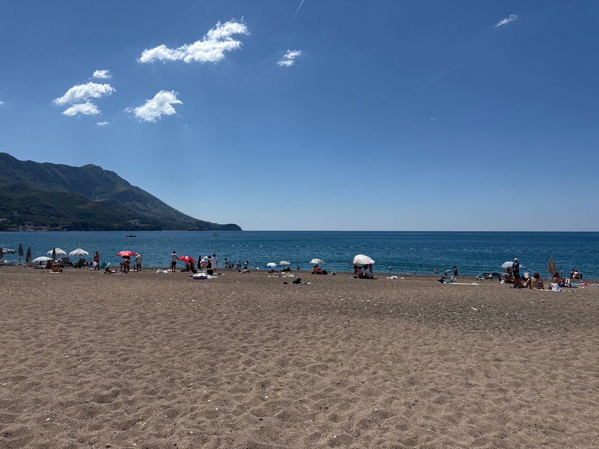 Summer morning along Montenegro's Budva Riviera beaches and streets