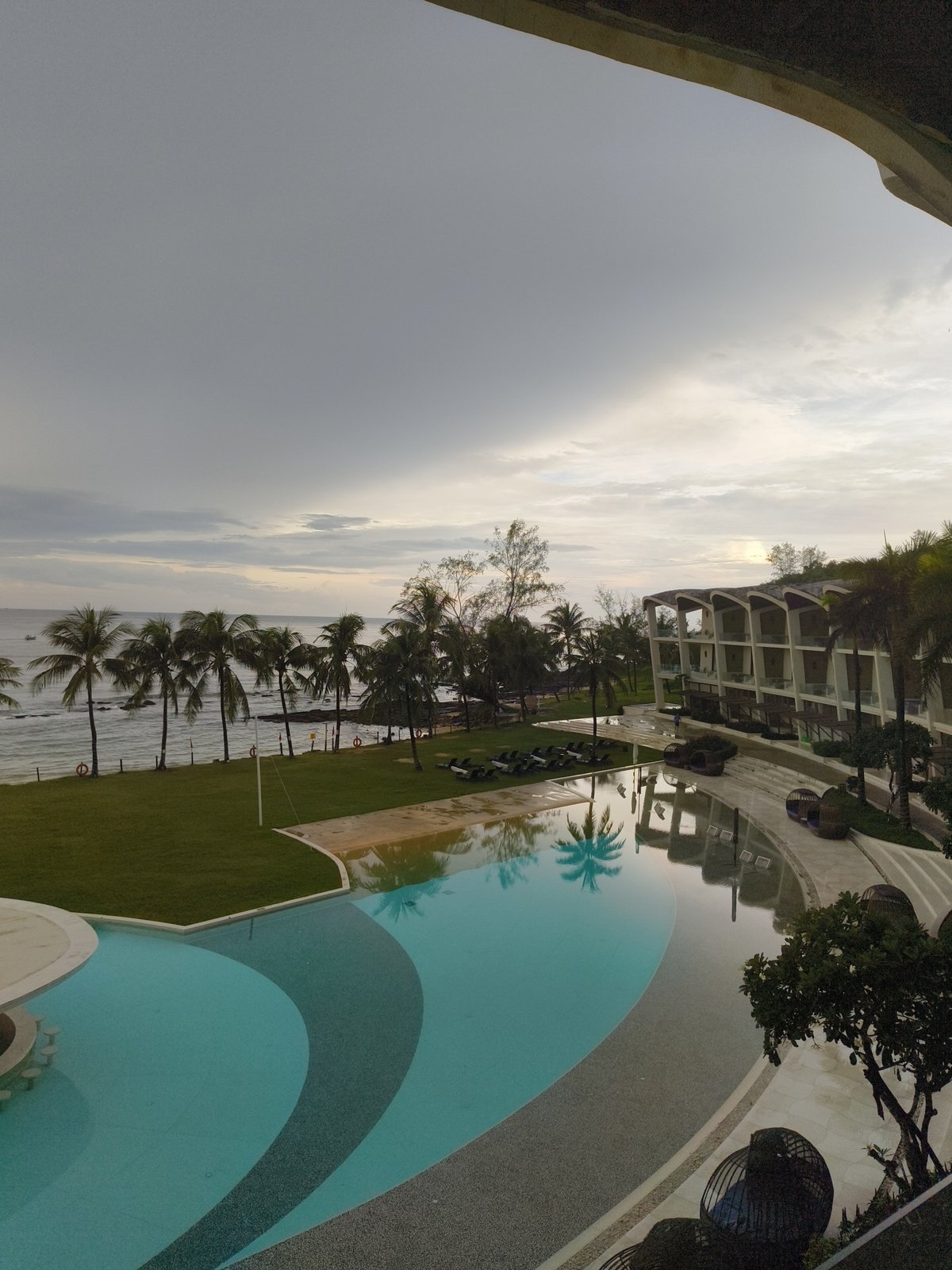 Phú Quốc resort pool with ocean views and sunken bar