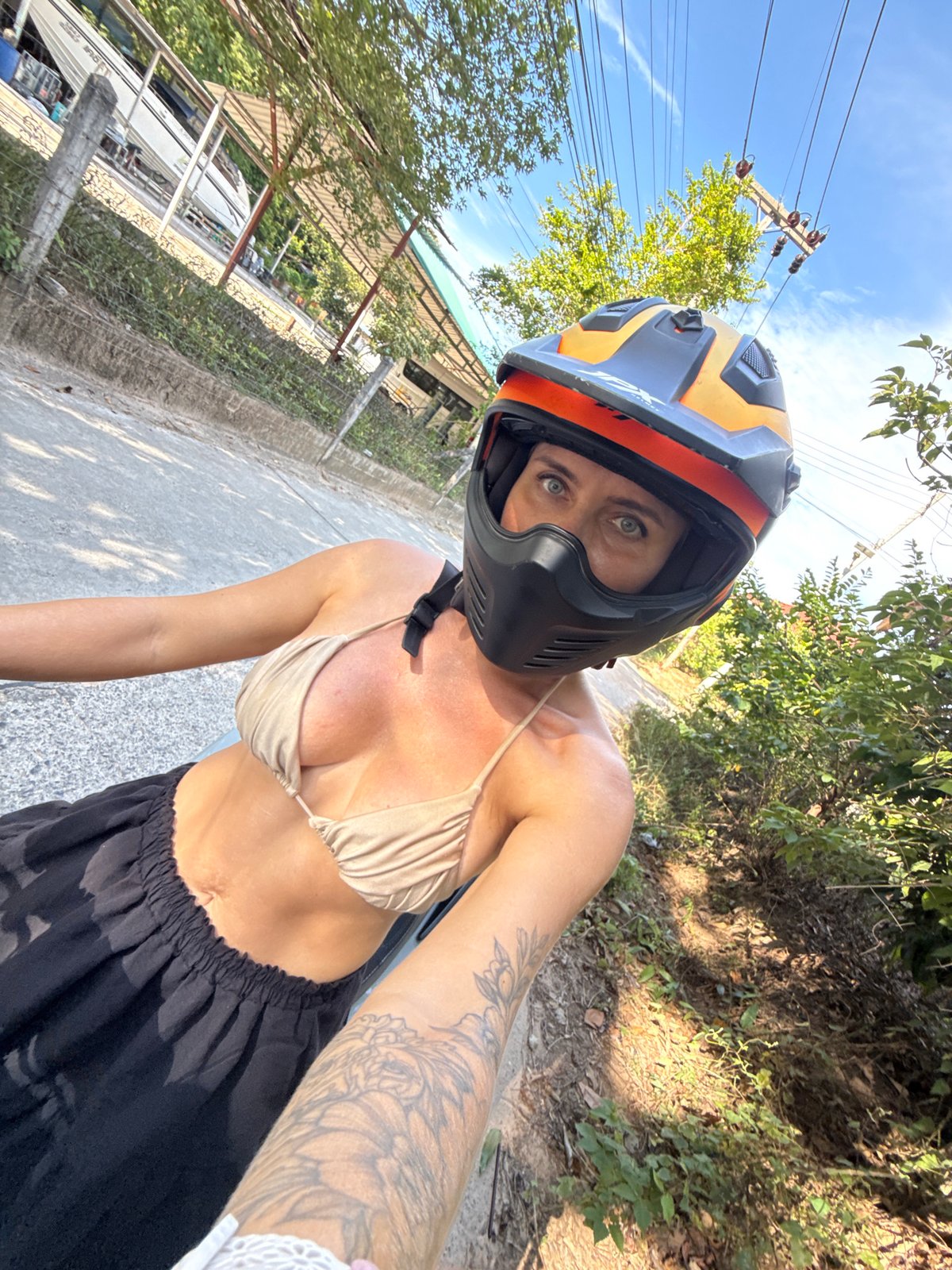 Scooter ride through Ko Samui's tree-lined roads