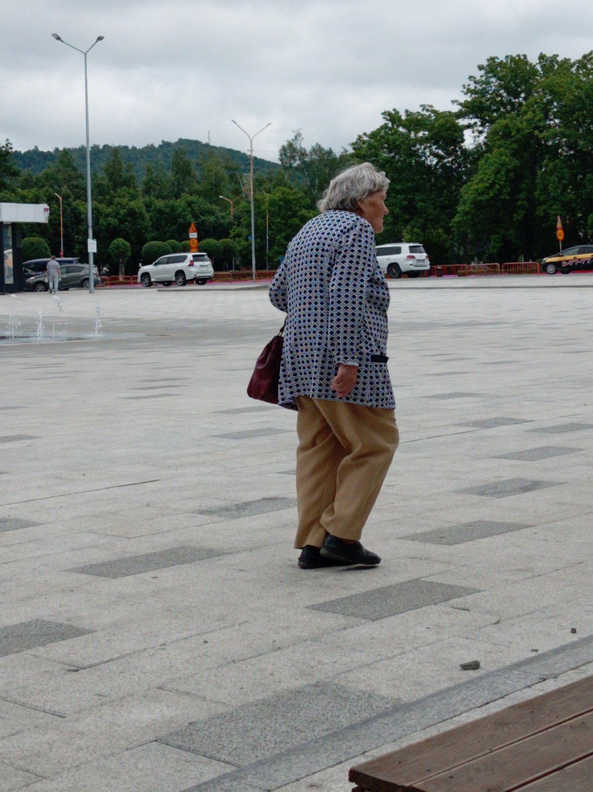 Public square life in Artyom on a grey June morning