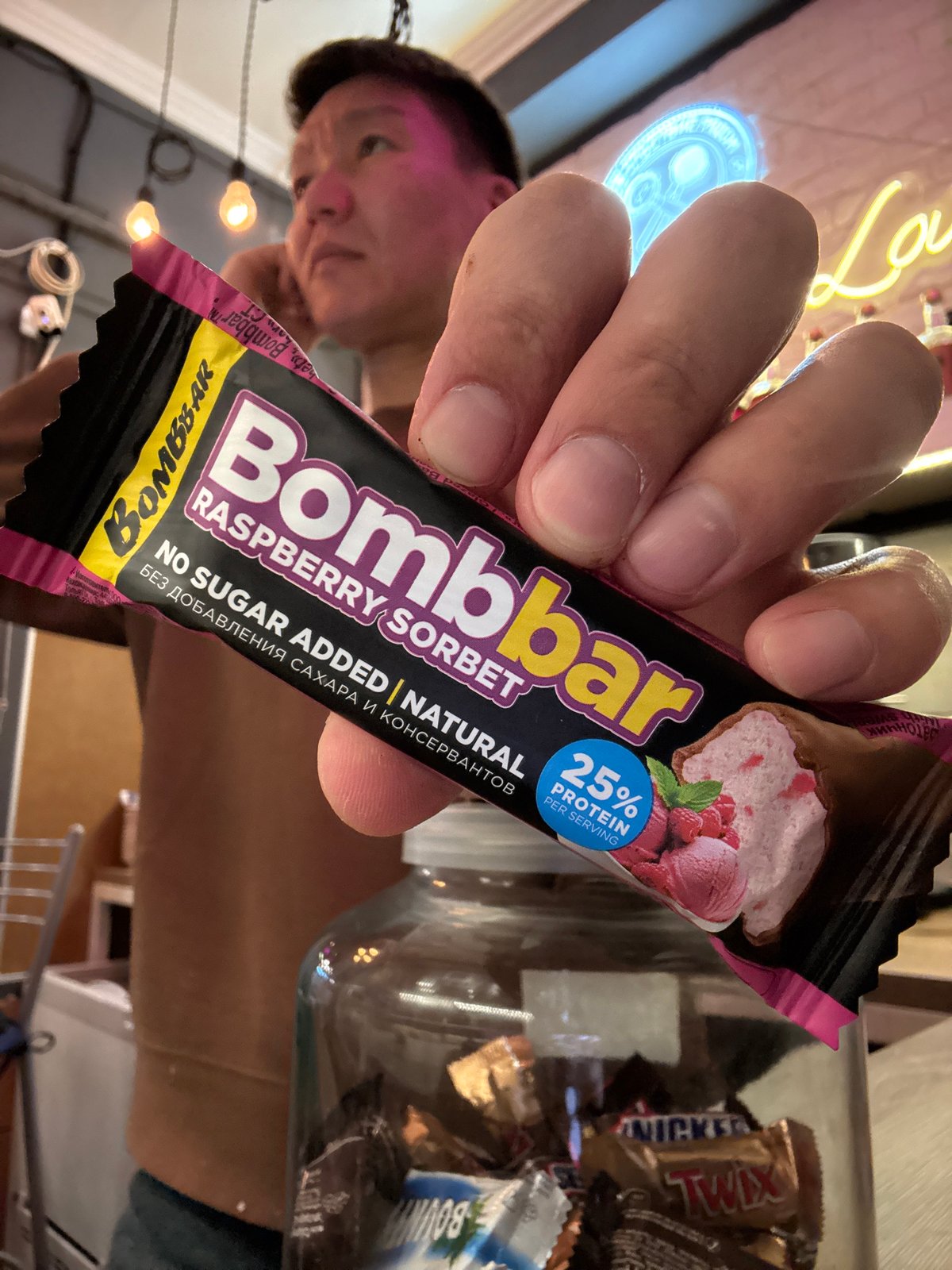 Person holds protein bar in Khimki, Russia