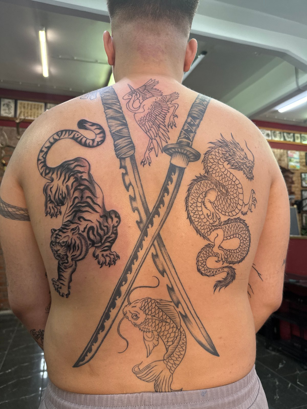 Fresh tattoo work documented in Moscow outdoor session