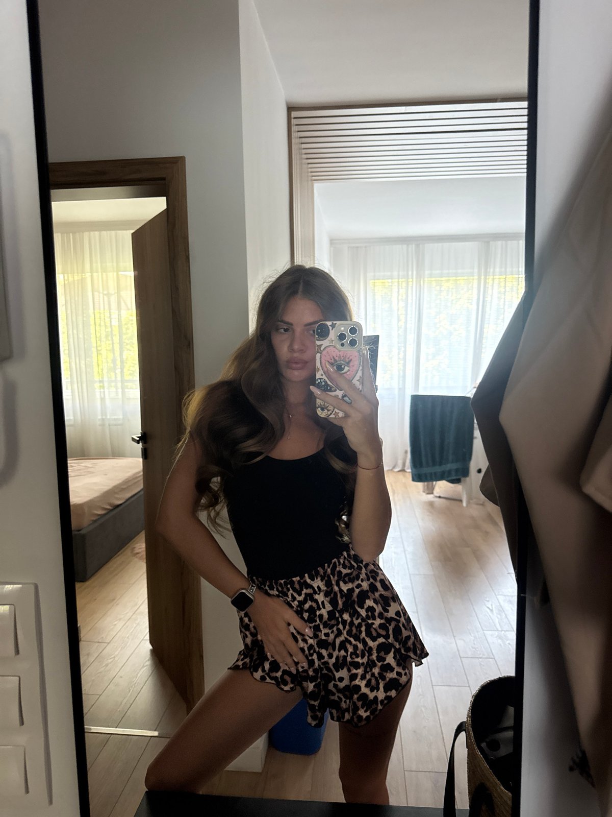 Selfie session across a Plovdiv apartment, indoors and out