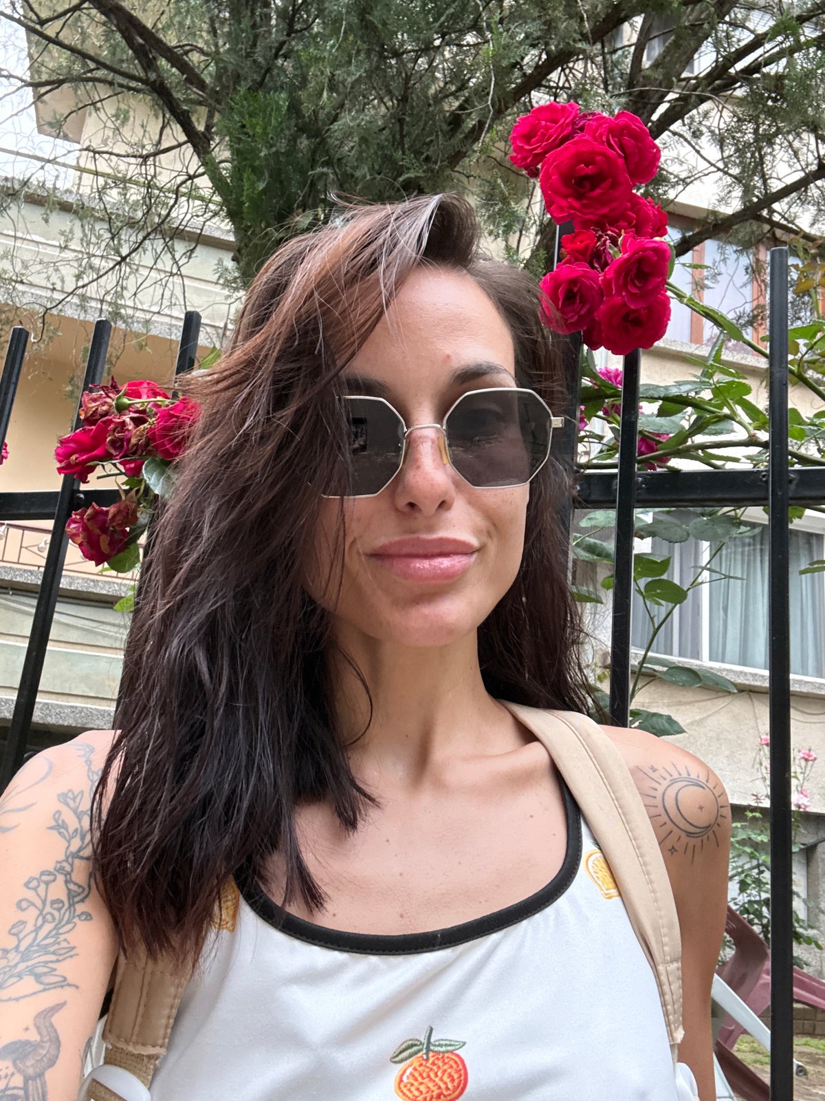 Woman documents park visit with selfies at Pleven fountains