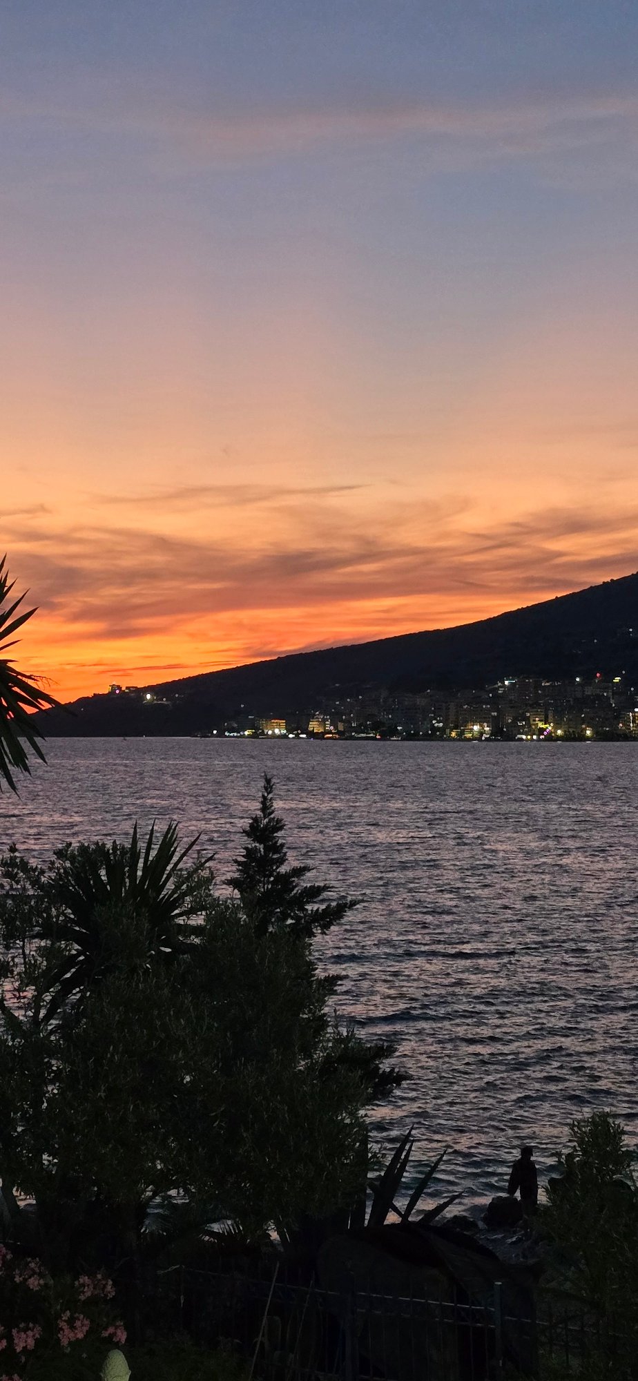 Saranda sunset from rooftops and waterfront, Ionian Sea