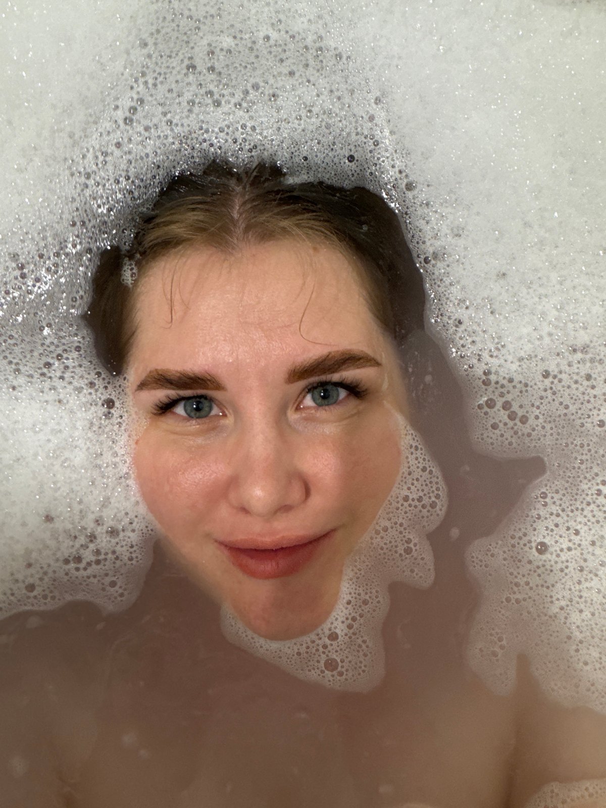 Woman's bath time documented in multiple recordings in Russia