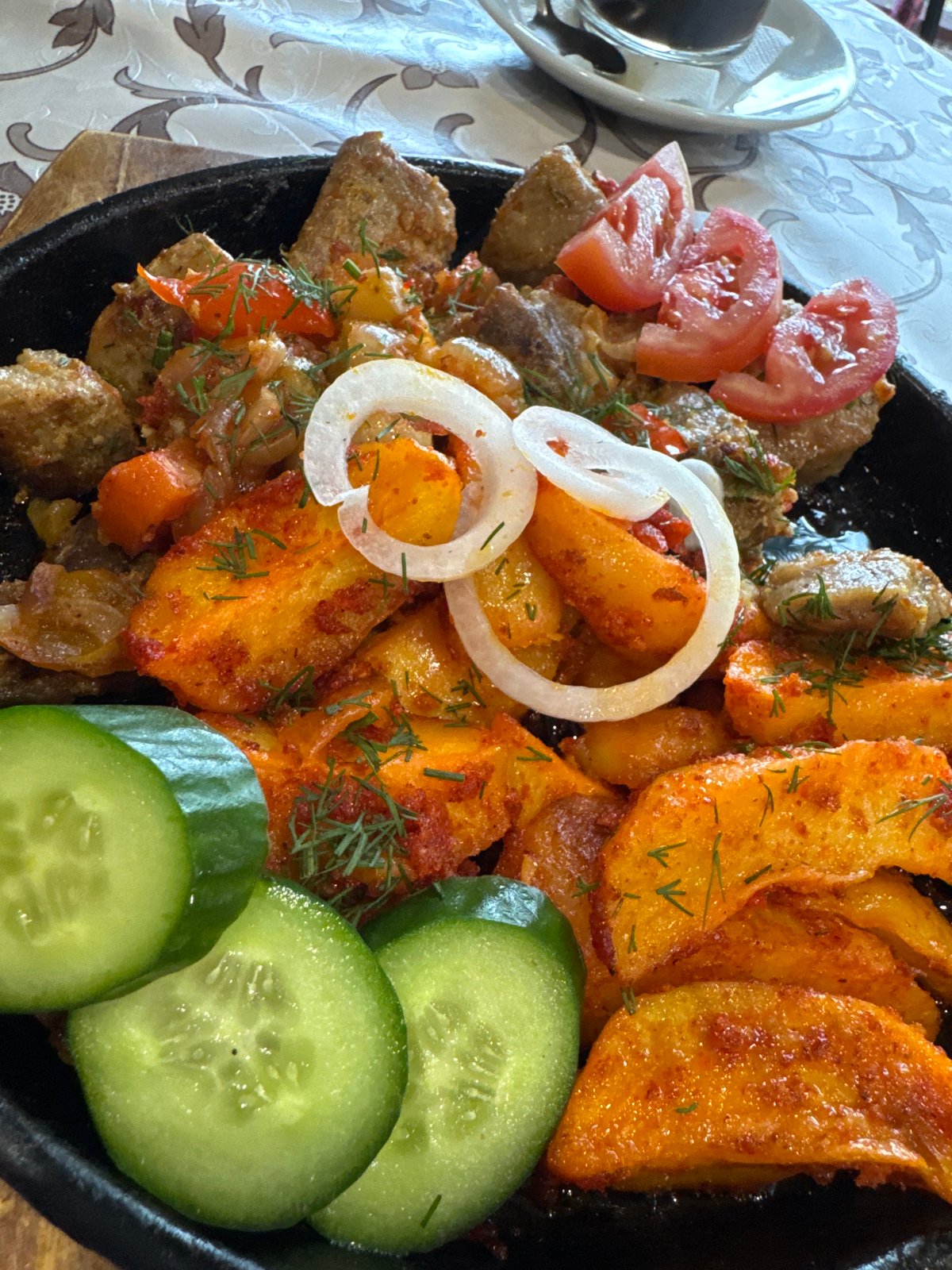 Restaurant visit documented in Bolotnitsa, Russia with traditional meal
