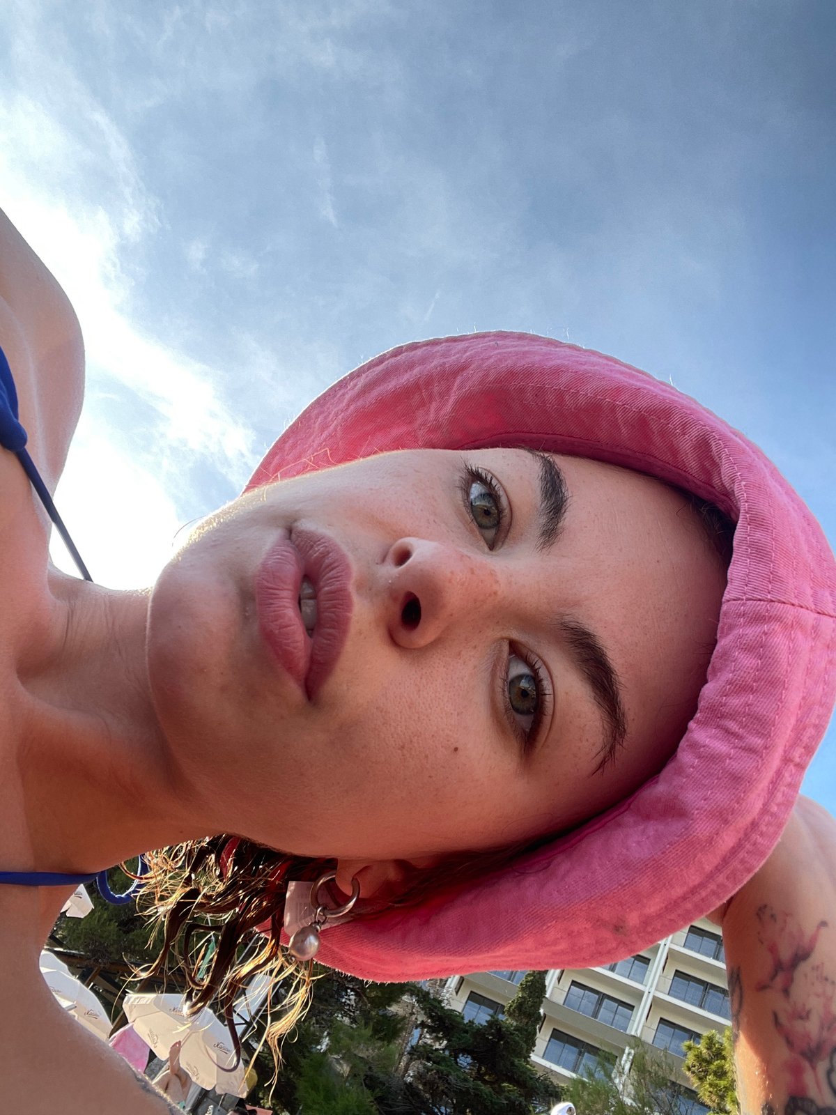 Woman enjoys beach day in Rafailovići, Montenegro