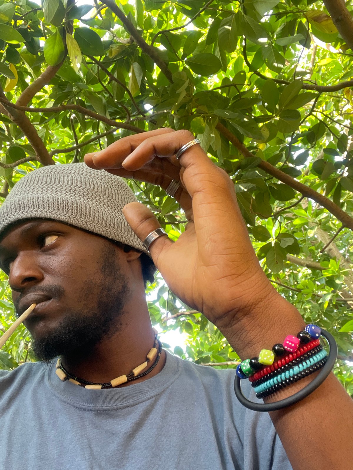 Man observed looking up at tree in Jos, Nigeria