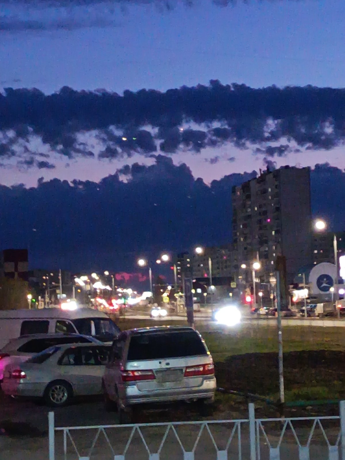 Twilight sky with crescent moon observed over Nizhnevartovsk