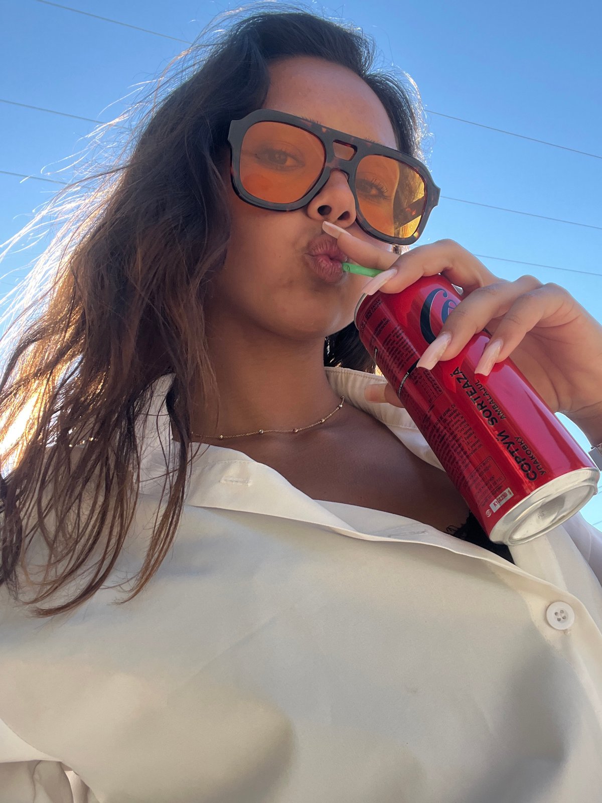 Afternoon stroll in Zlatograd, red can and rings in hand