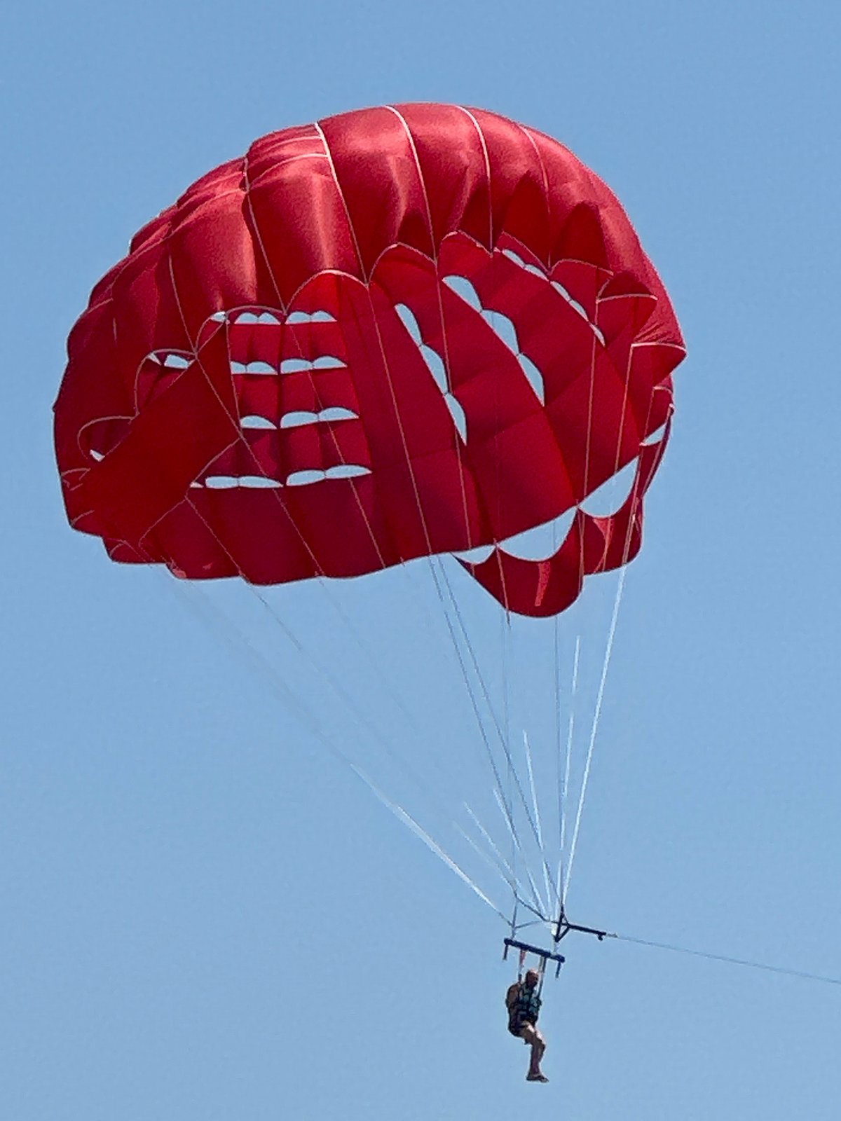 Parasailing and watersports on a sunny Budva morning