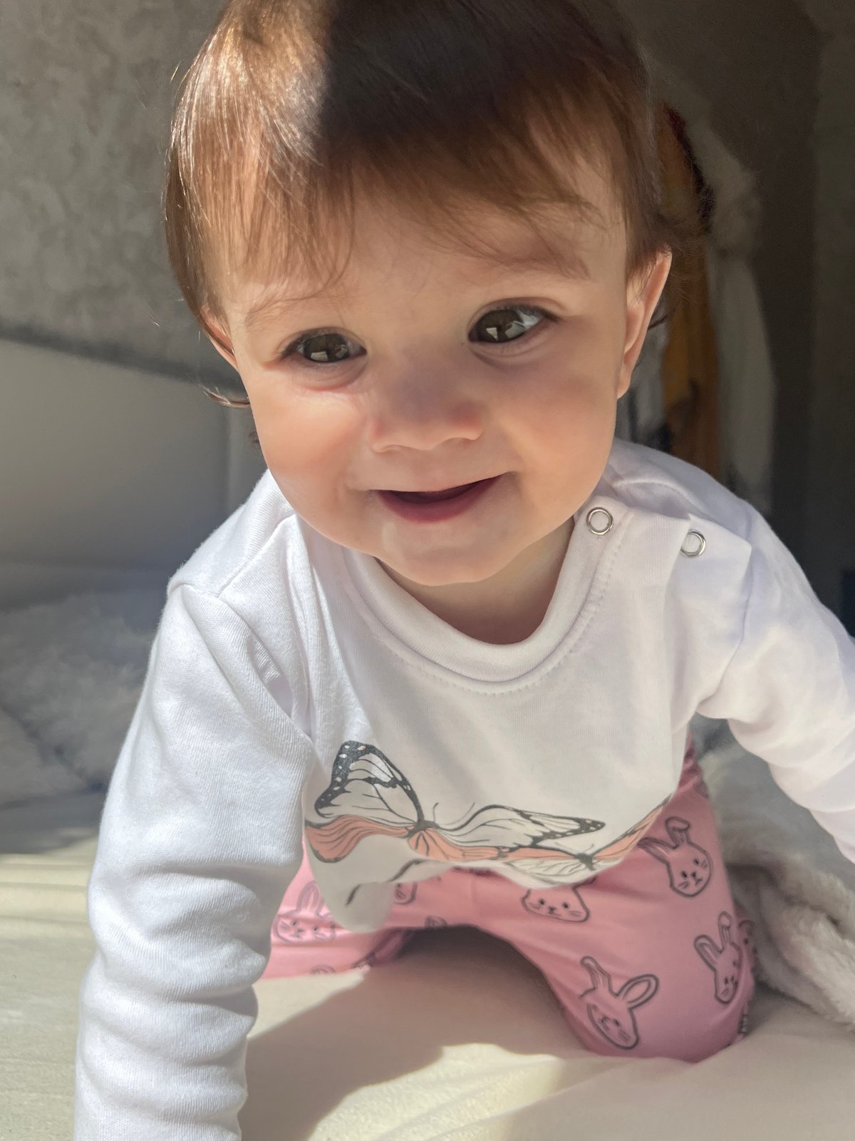 Baby girl photographed in playful moments in Elena, Bulgaria