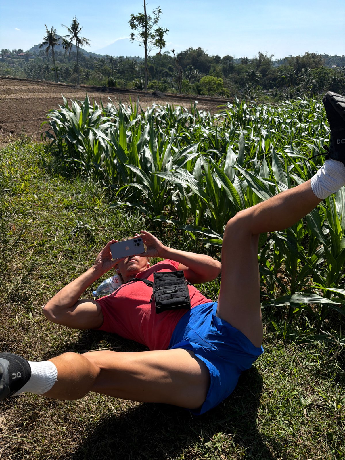 Resting by a cornfield in rural Dampit, Indonesia