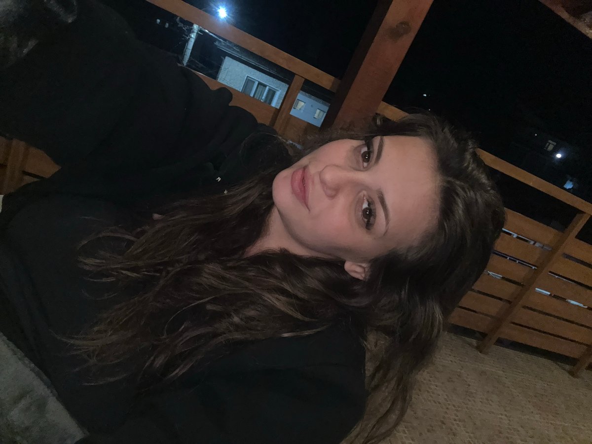 Intimate evening gathering documented on Velingrad patio with drinks