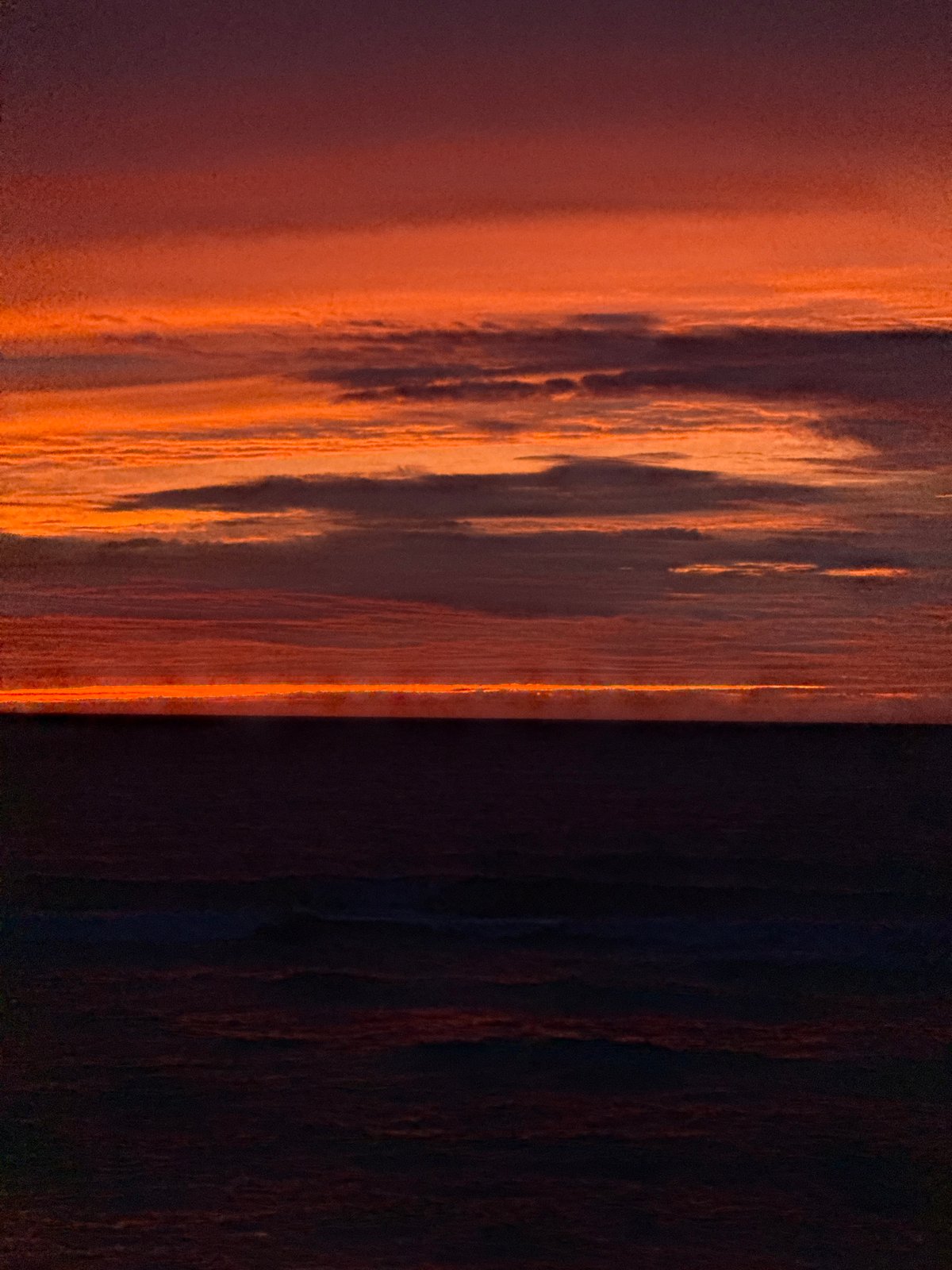 Sunset to twilight on Lý Sơn's rocky shore