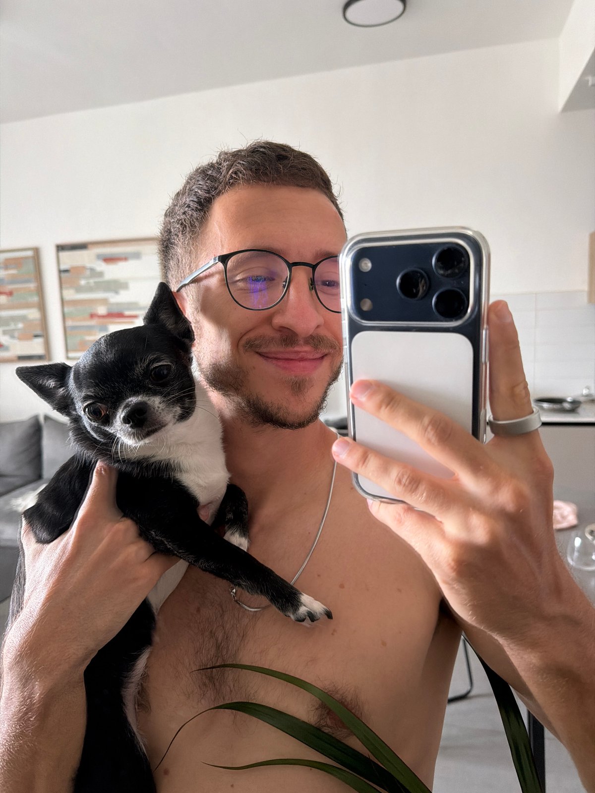 Man takes selfies with dog, companion in Tel Aviv building
