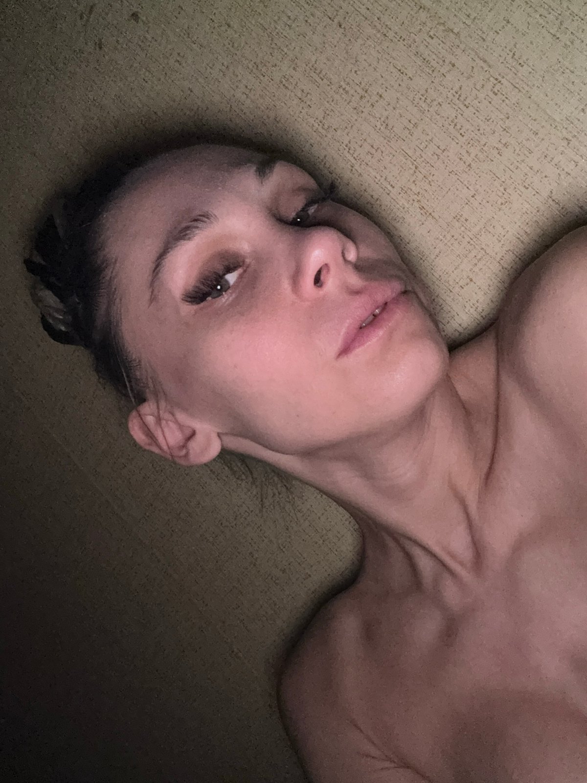 Woman resting on couch in Rusanovo, Russia