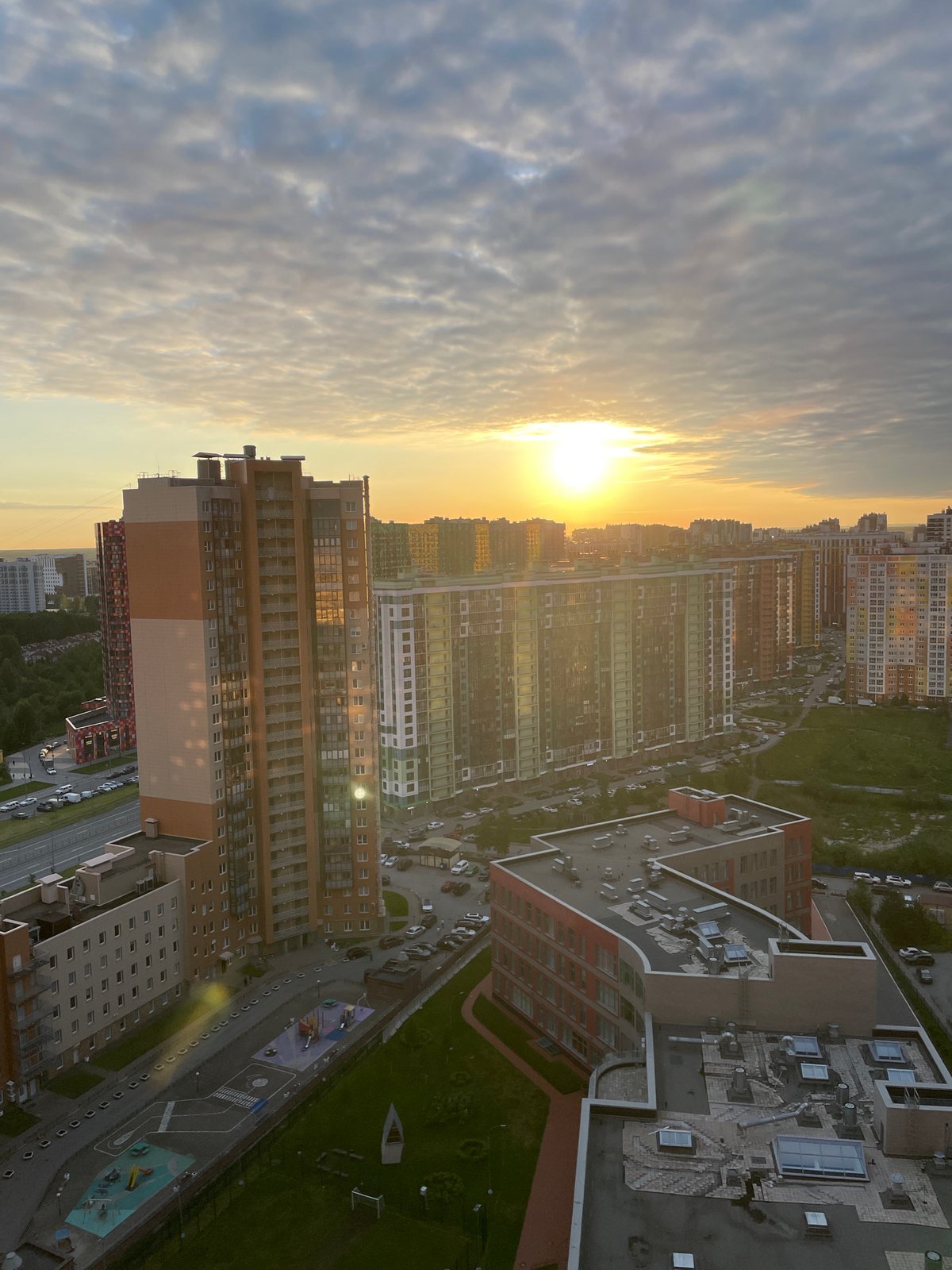 Golden hour illuminates Saint Petersburg's urban skyline from above