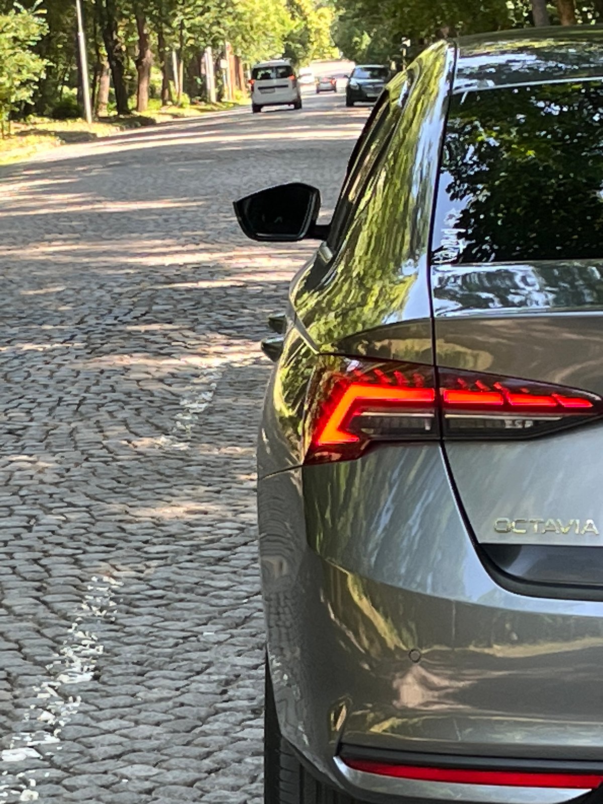 Silver Skoda parked on cobblestone street in Sofia