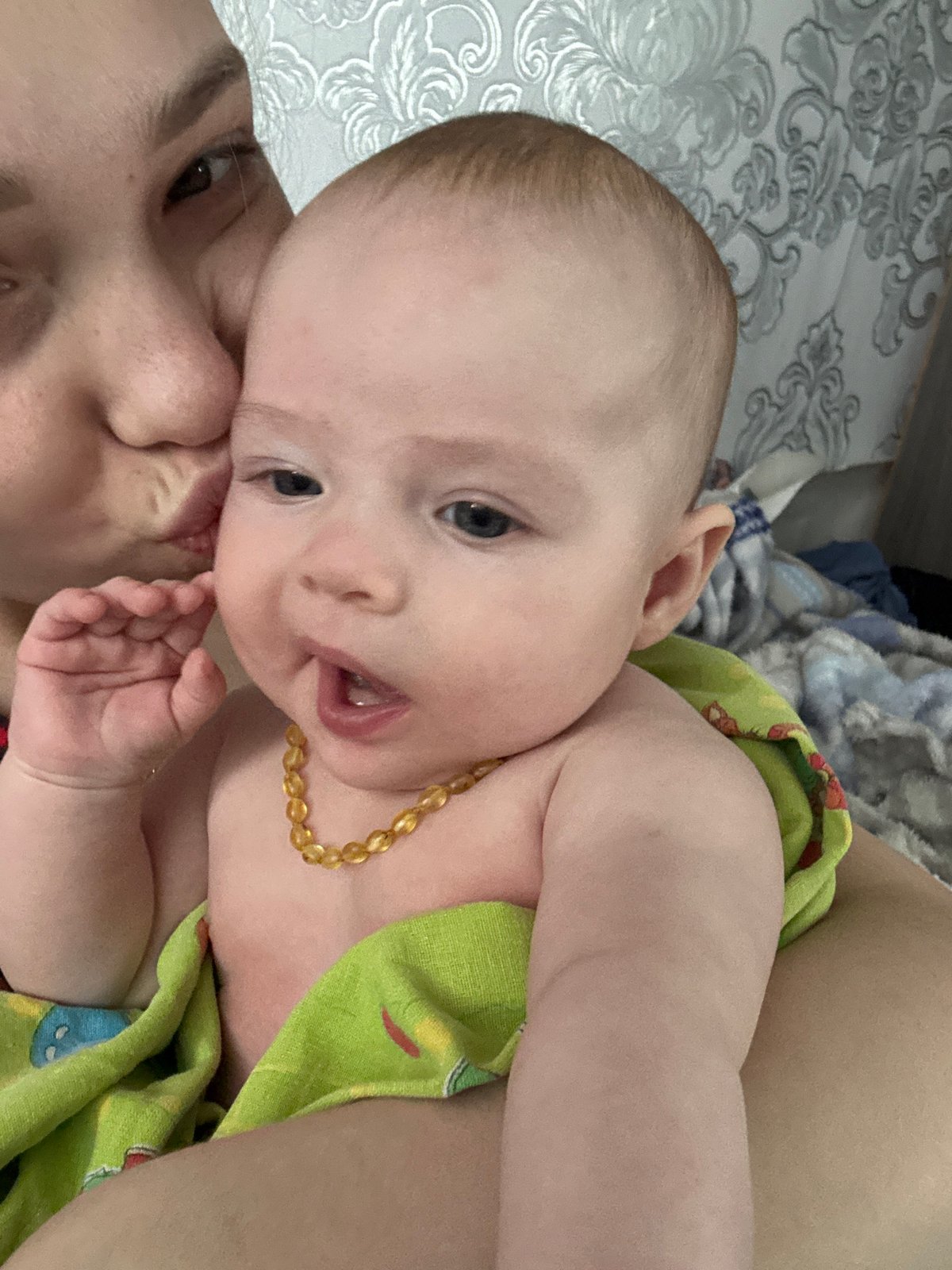 Mother and baby share tender moments in Кемуль