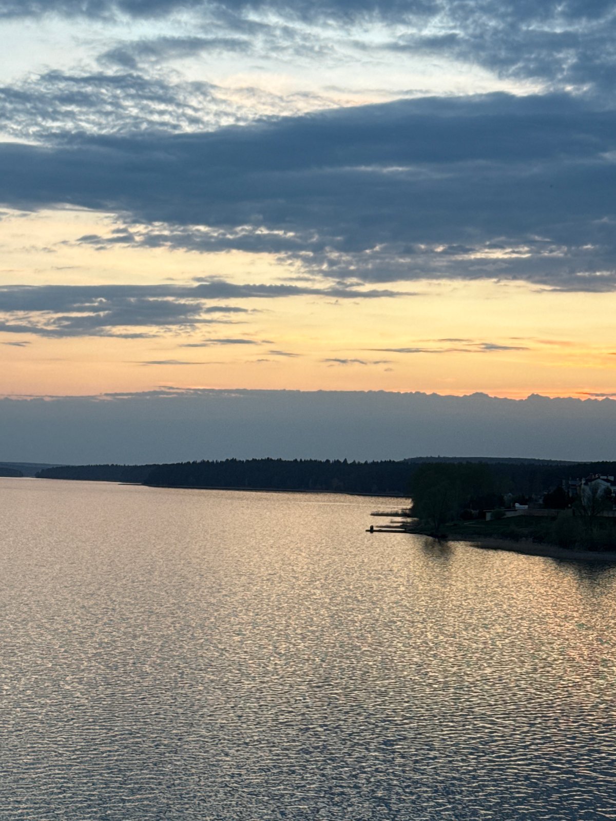 Sunset captured over Votkinsk Reservoir with kayak sighting
