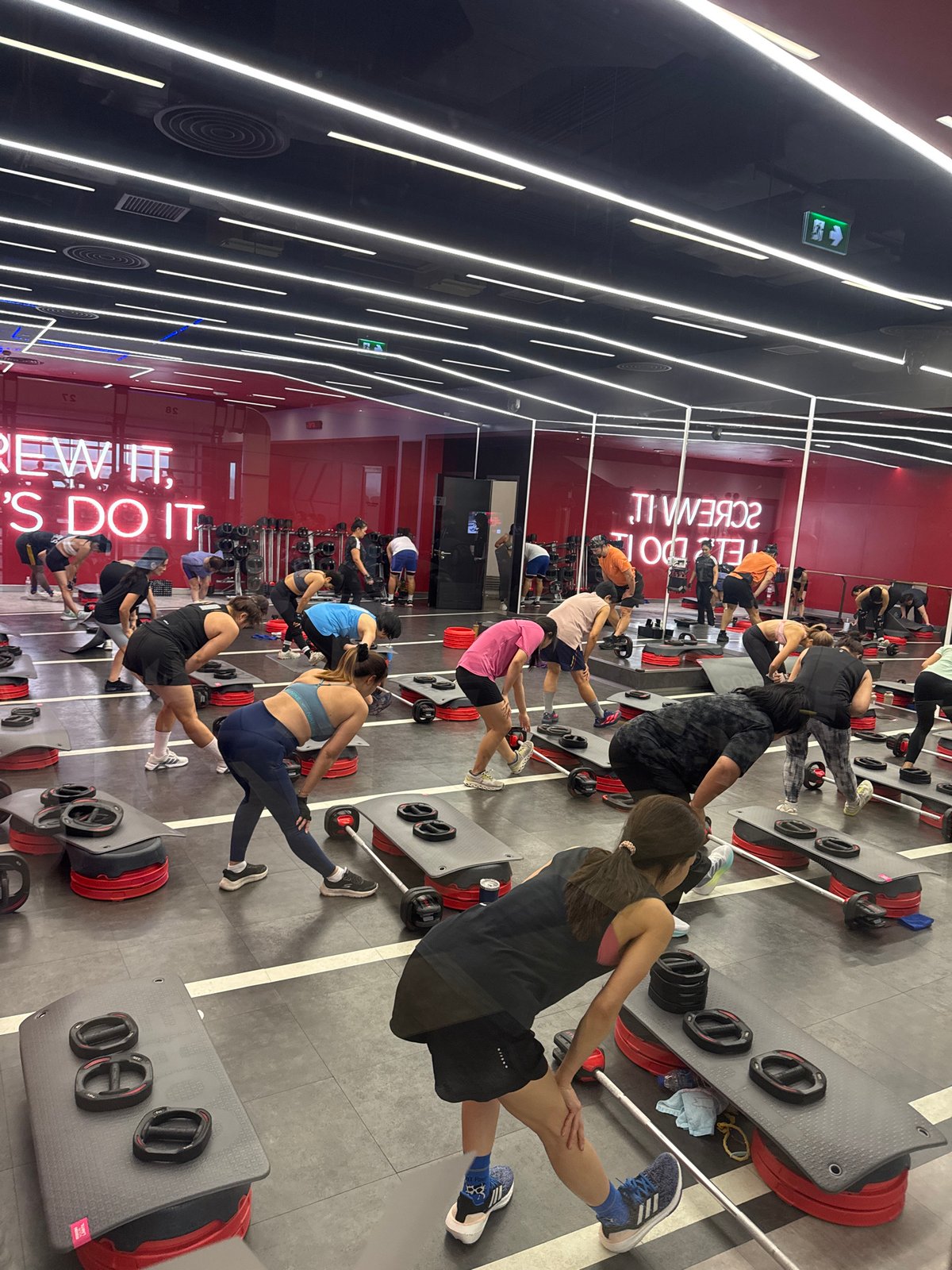 Inside a Chiang Mai fitness studio during a busy morning session