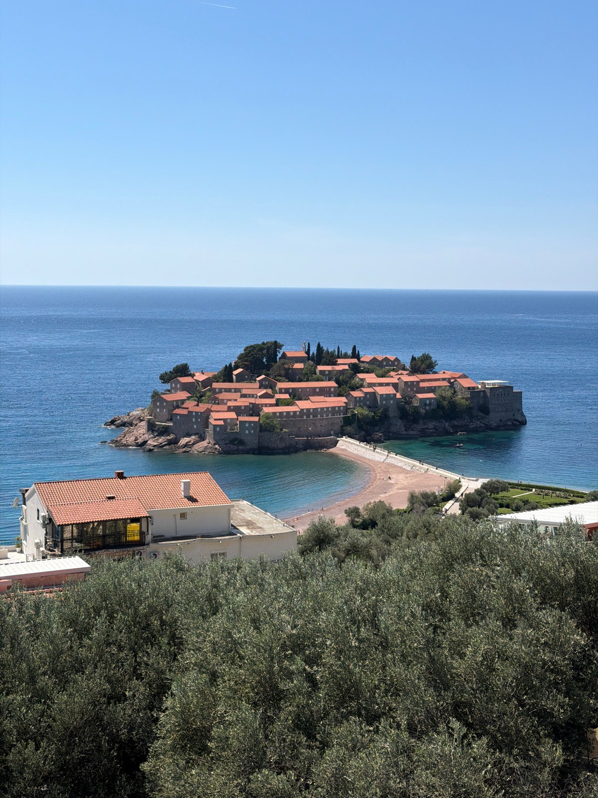 Tourist captures scenic views of Sveti Stefan island resort