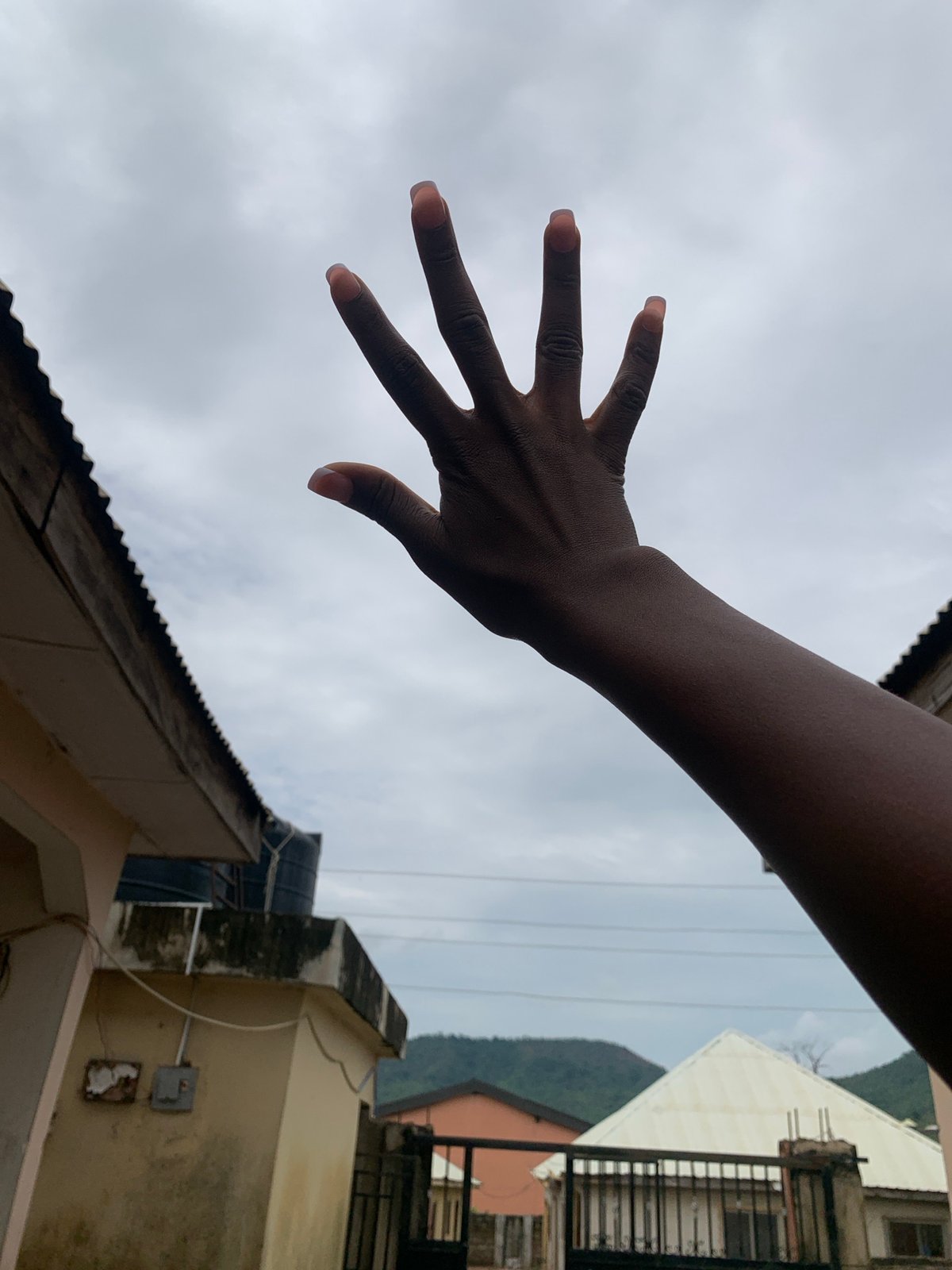 Daily life moments captured in Lokoja courtyards