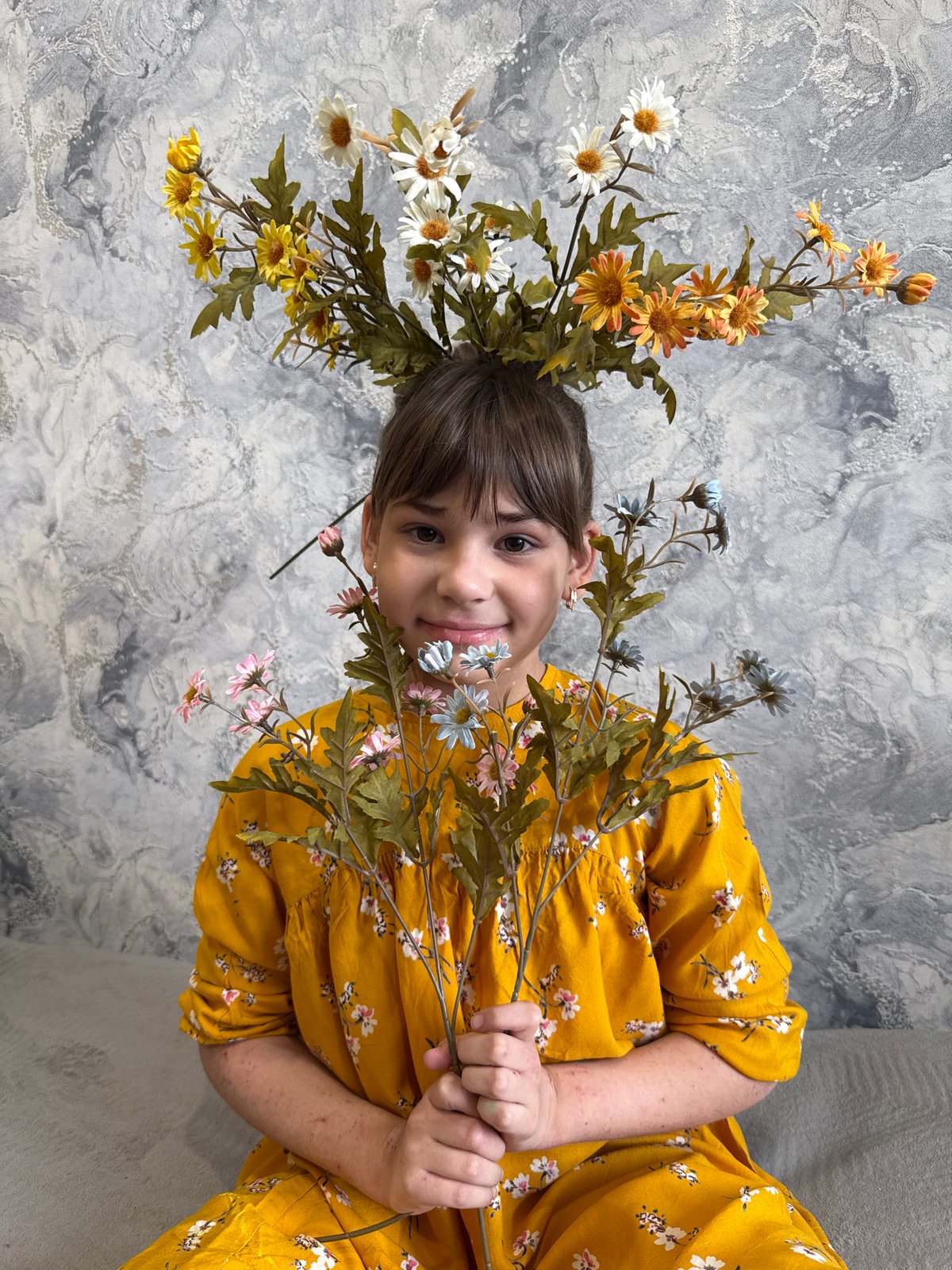 Children create art with window painting and flower arrangements
