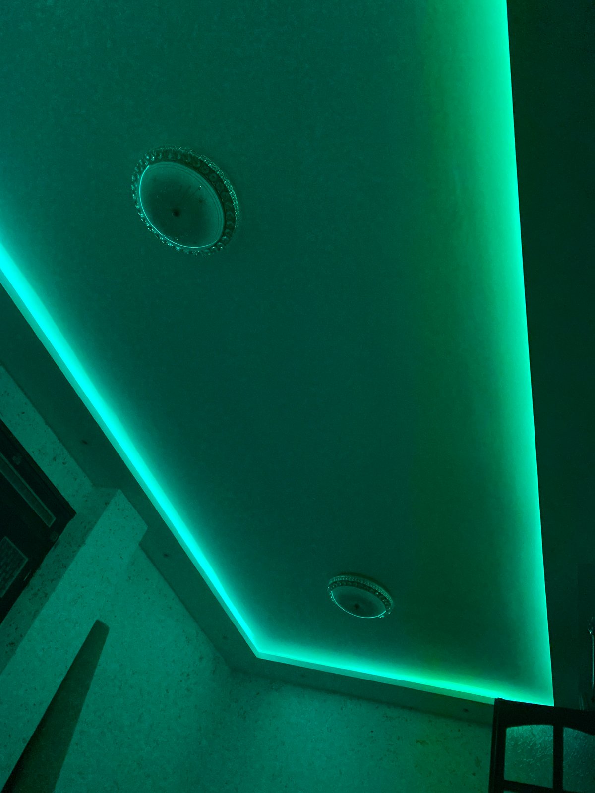 Color-changing LED ceiling lights documented in Baraki, Algeria