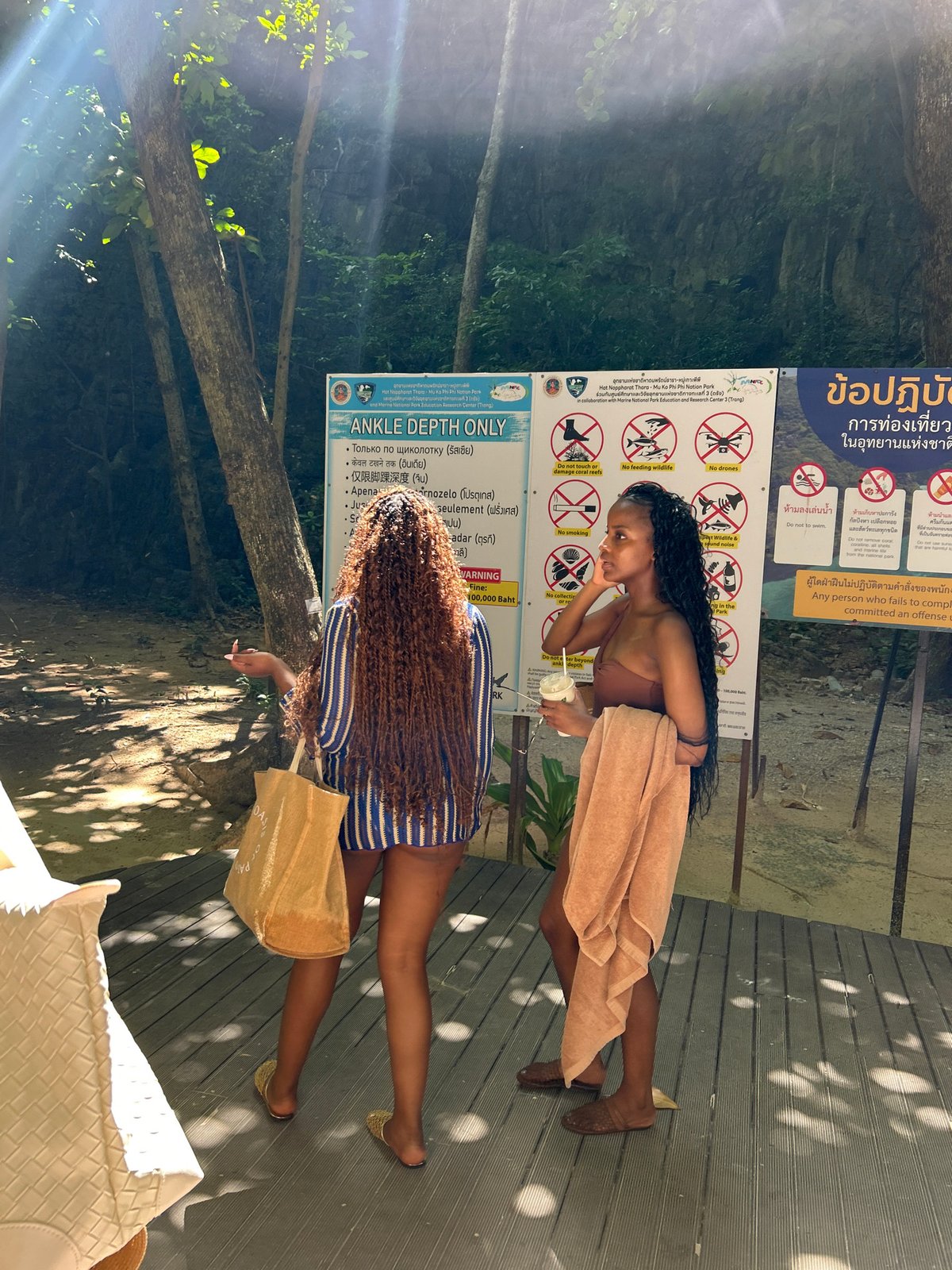 Ao Nang beach and boardwalk on a busy tropical afternoon
