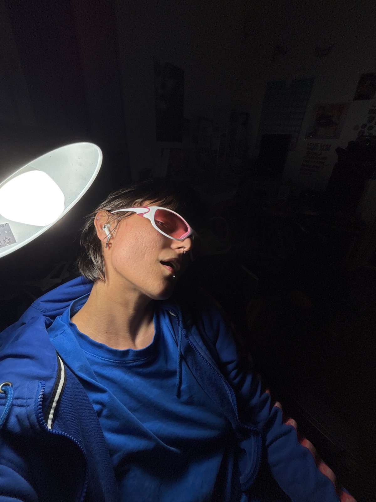 Person in pink-tinted sunglasses spotted in Sofia room