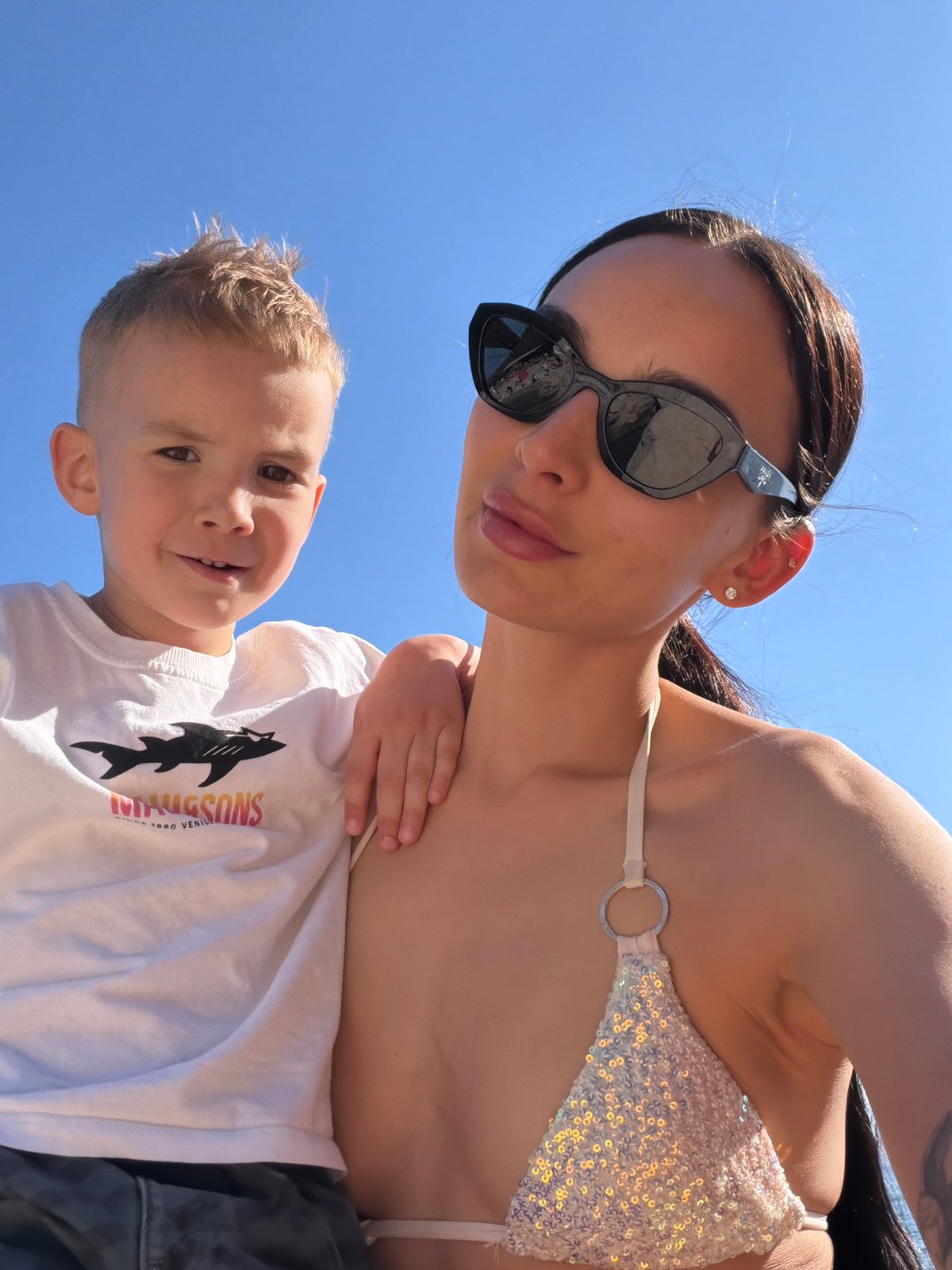 Mother and child enjoy seaside outing in Kostrena, Croatia