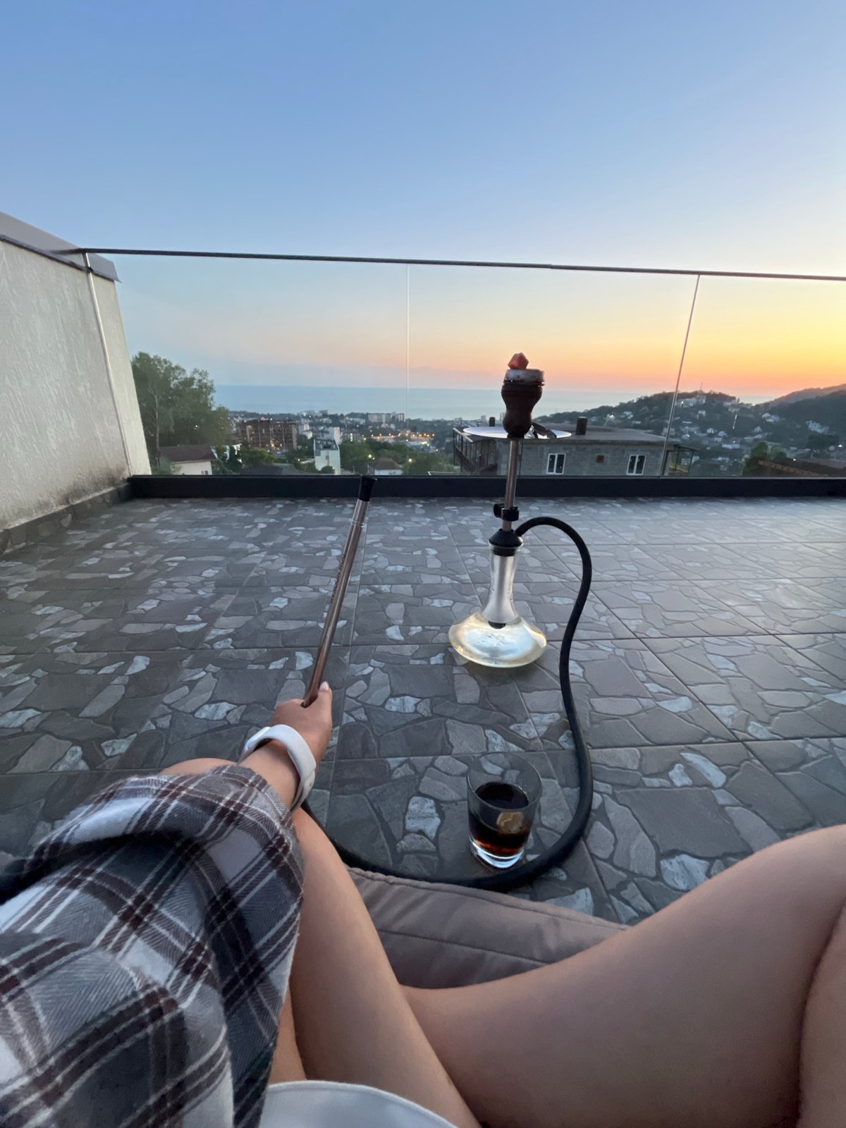 Sunset terrace barbecue gathering documented in Baranovka, Russia