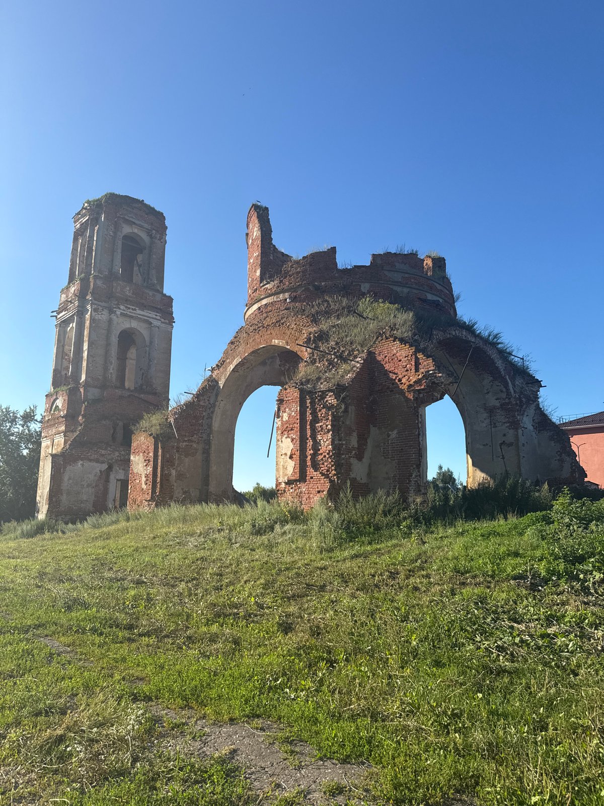 Afternoon at an Orthodox monastery with ruins, domes, and grounds