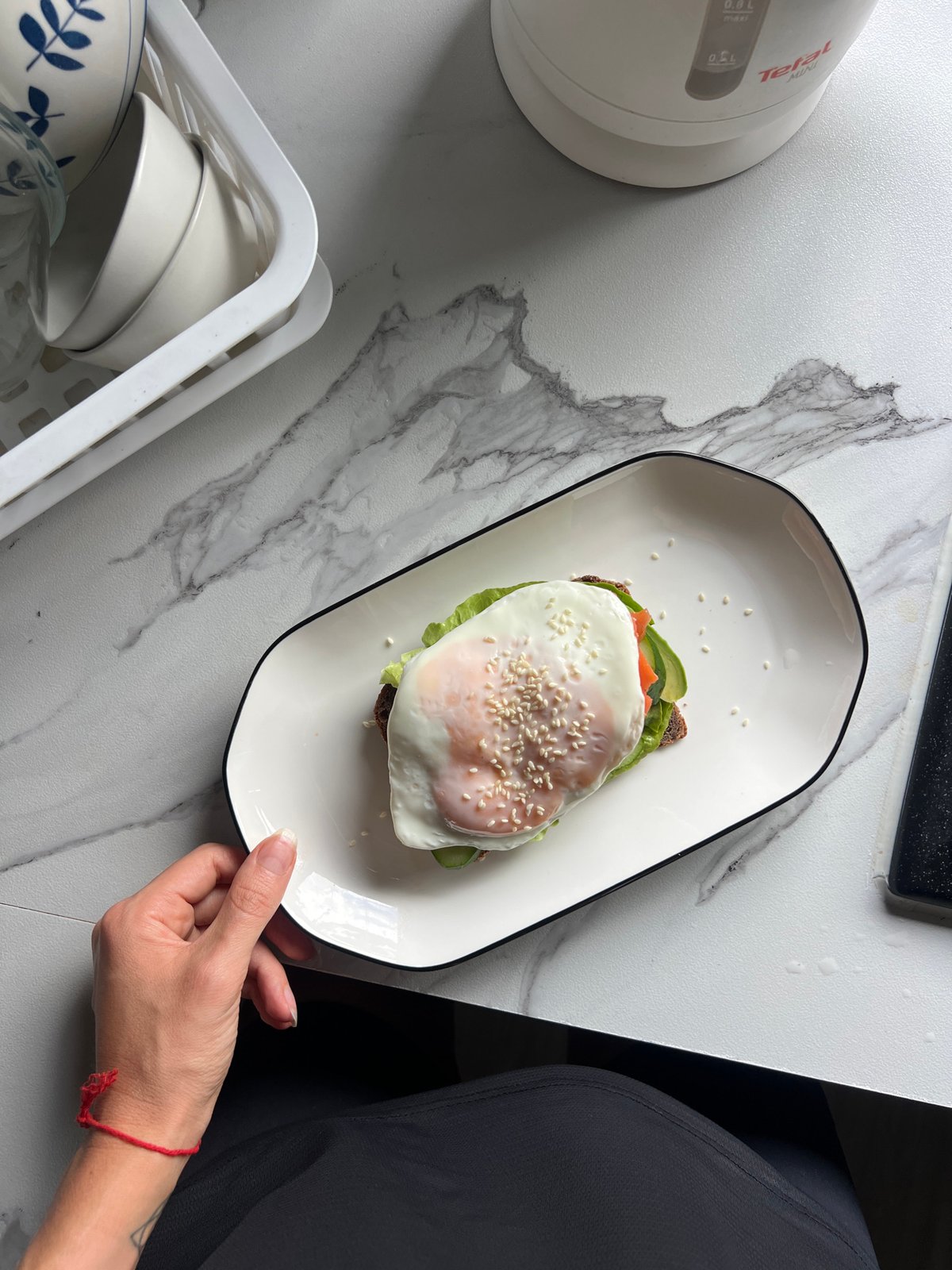 Morning routine documented through car journey and breakfast preparation