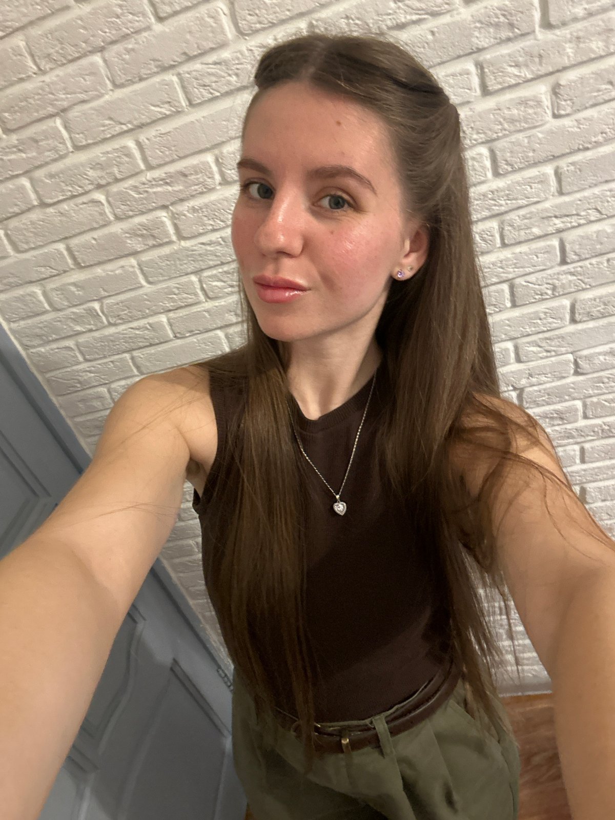 Woman documents morning selfie session in Klin, Russia