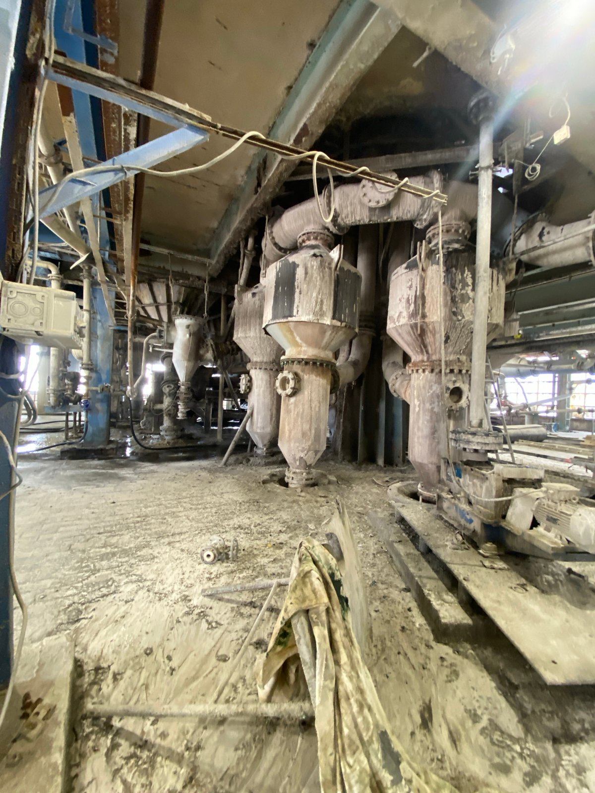 Inside a dusty, aging industrial plant in Police, Poland