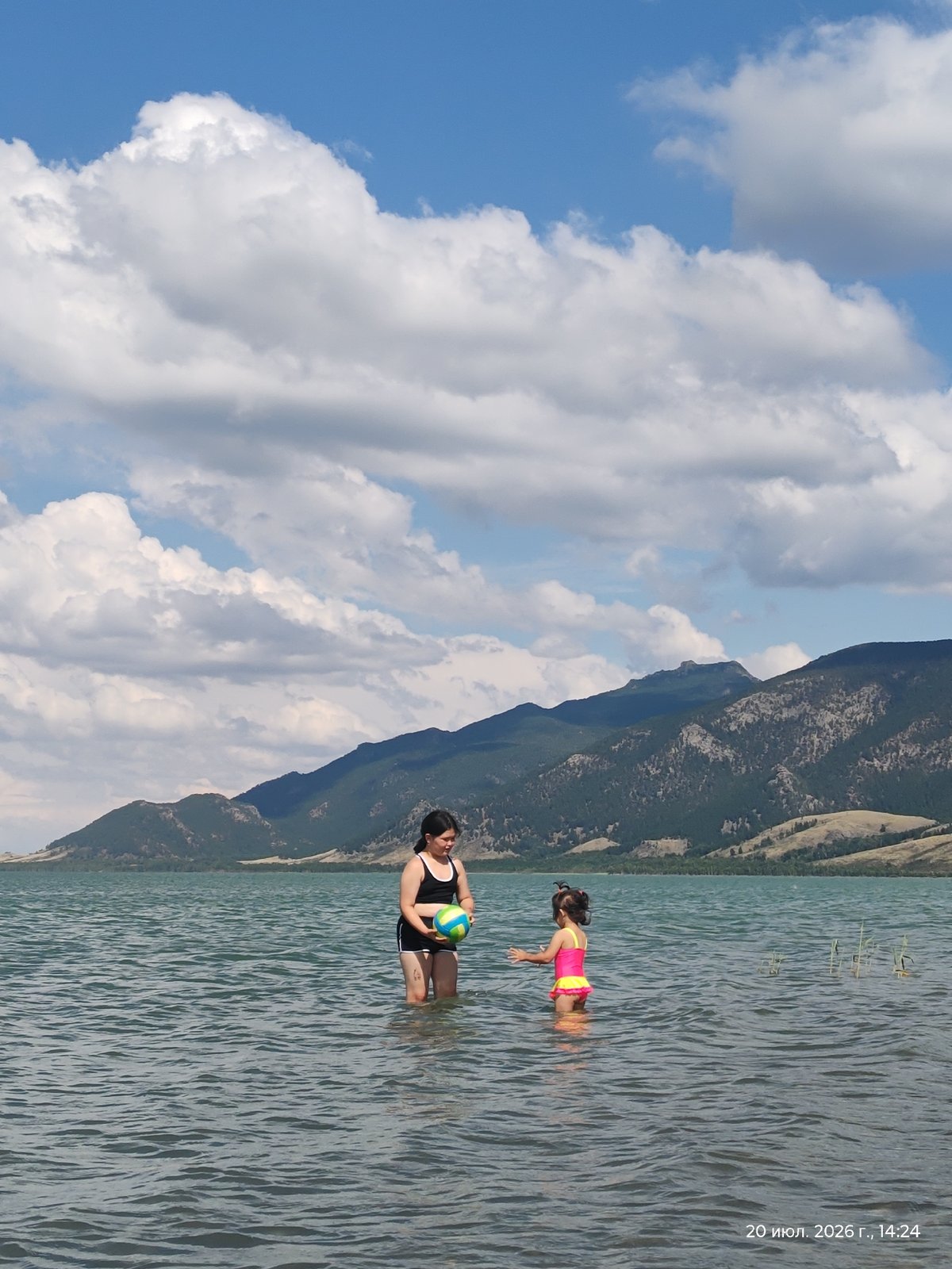 Lake day near Акылбай: swimming, camping, and mountain views