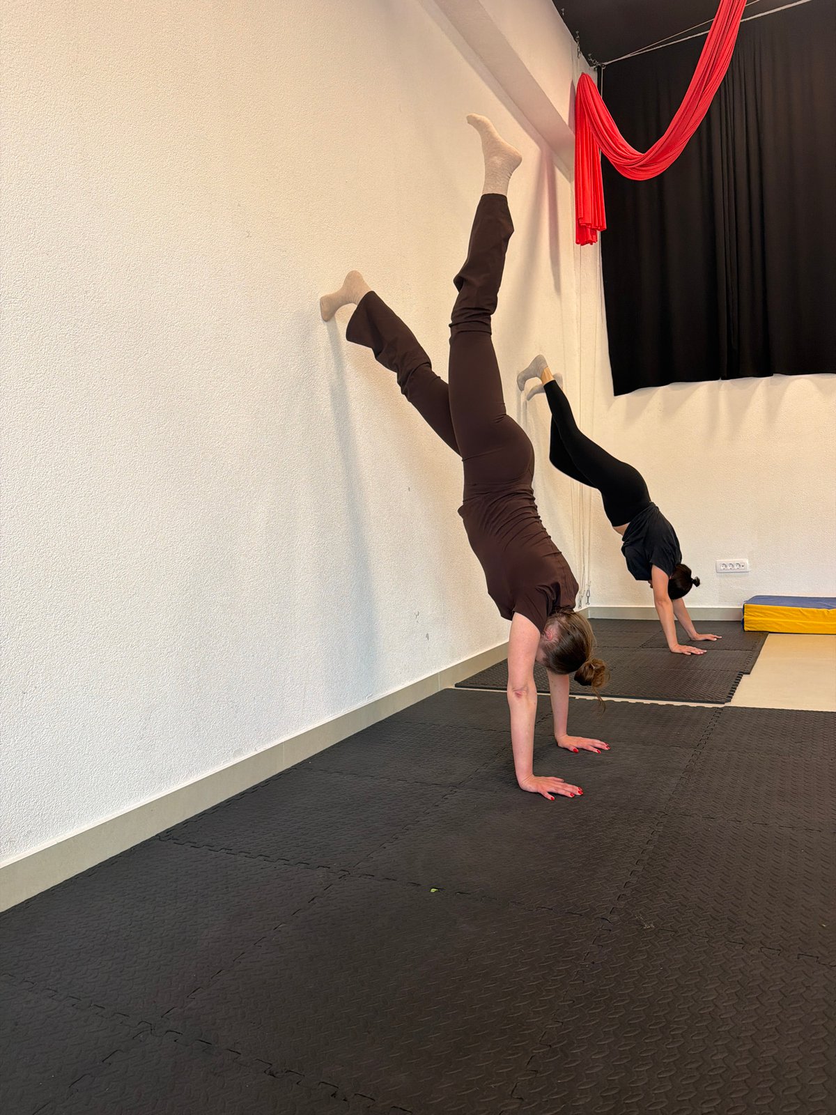 Women perform floating exercise routine in Montenegro studio